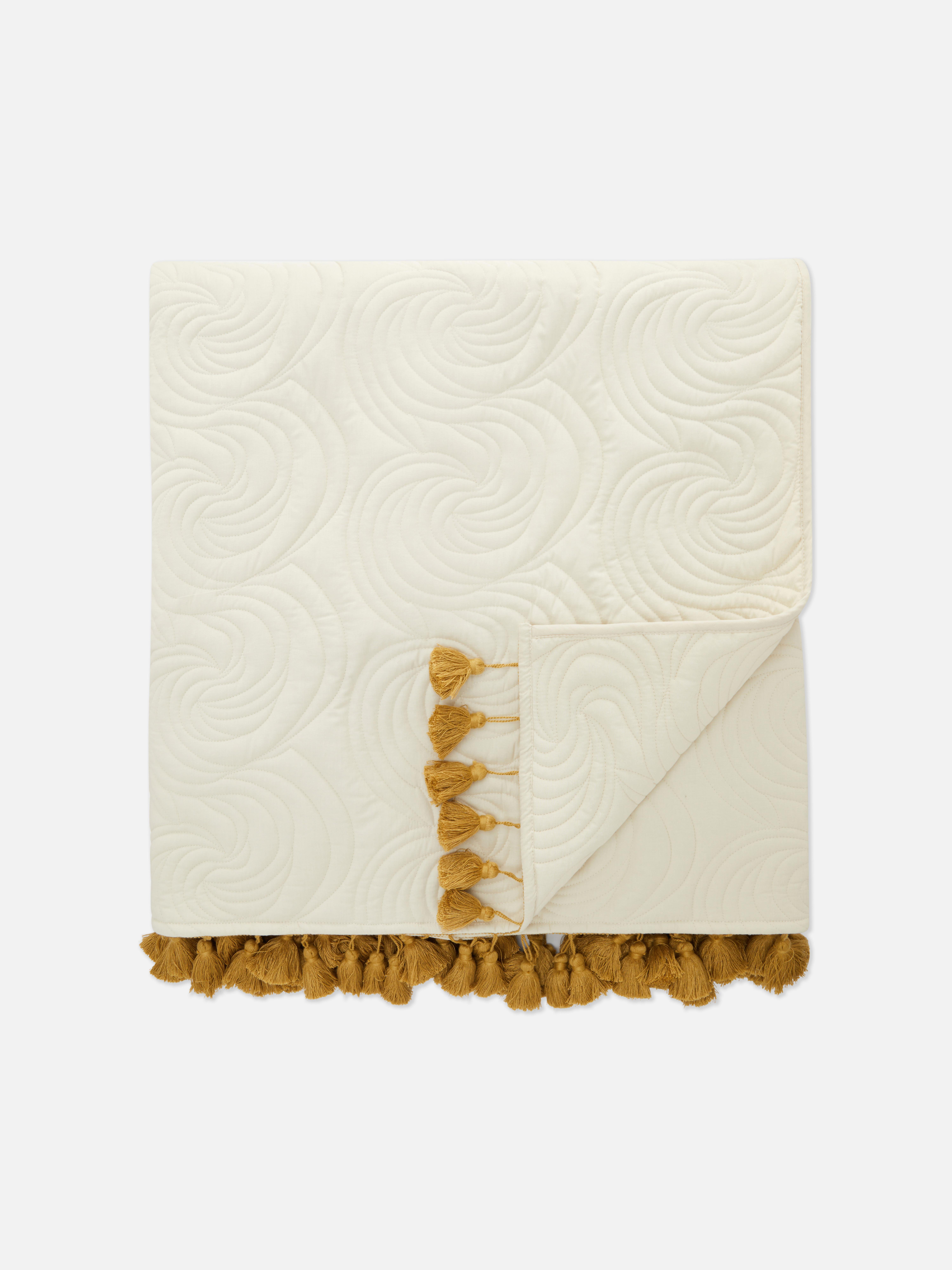 Coperta trapuntata con nappe The Edit