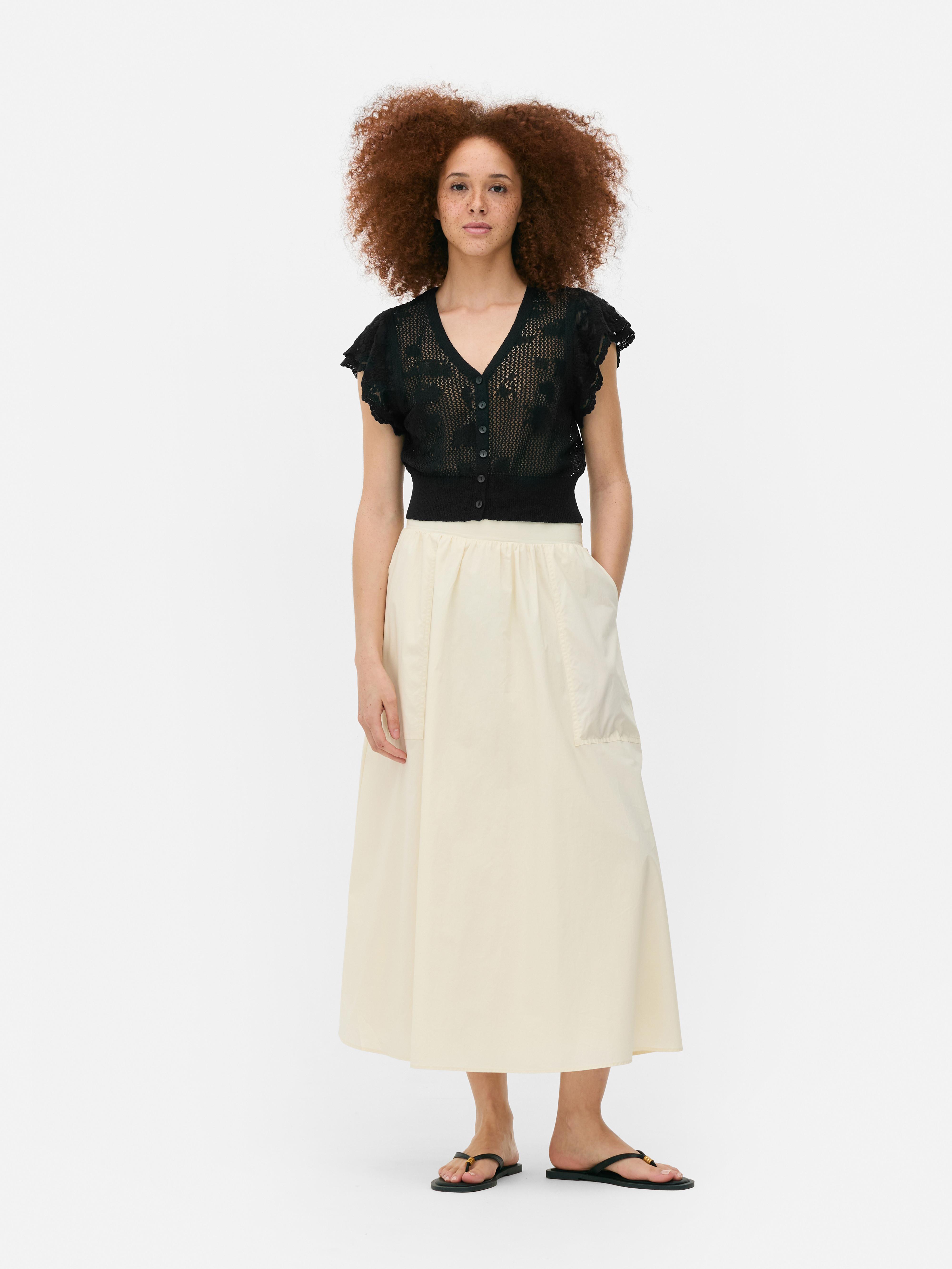 Kort vest met ruchemouwen