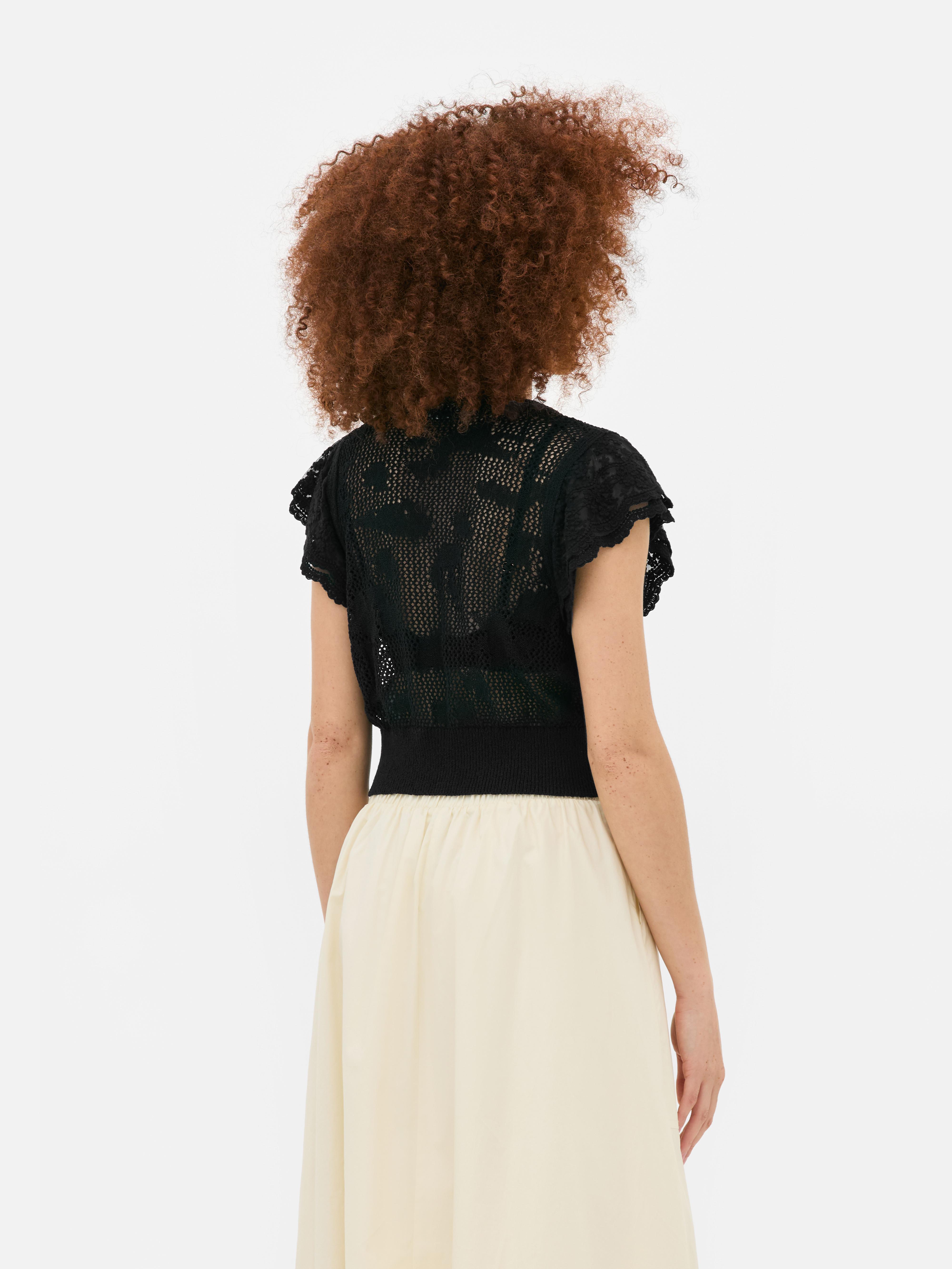 Kort vest met ruchemouwen