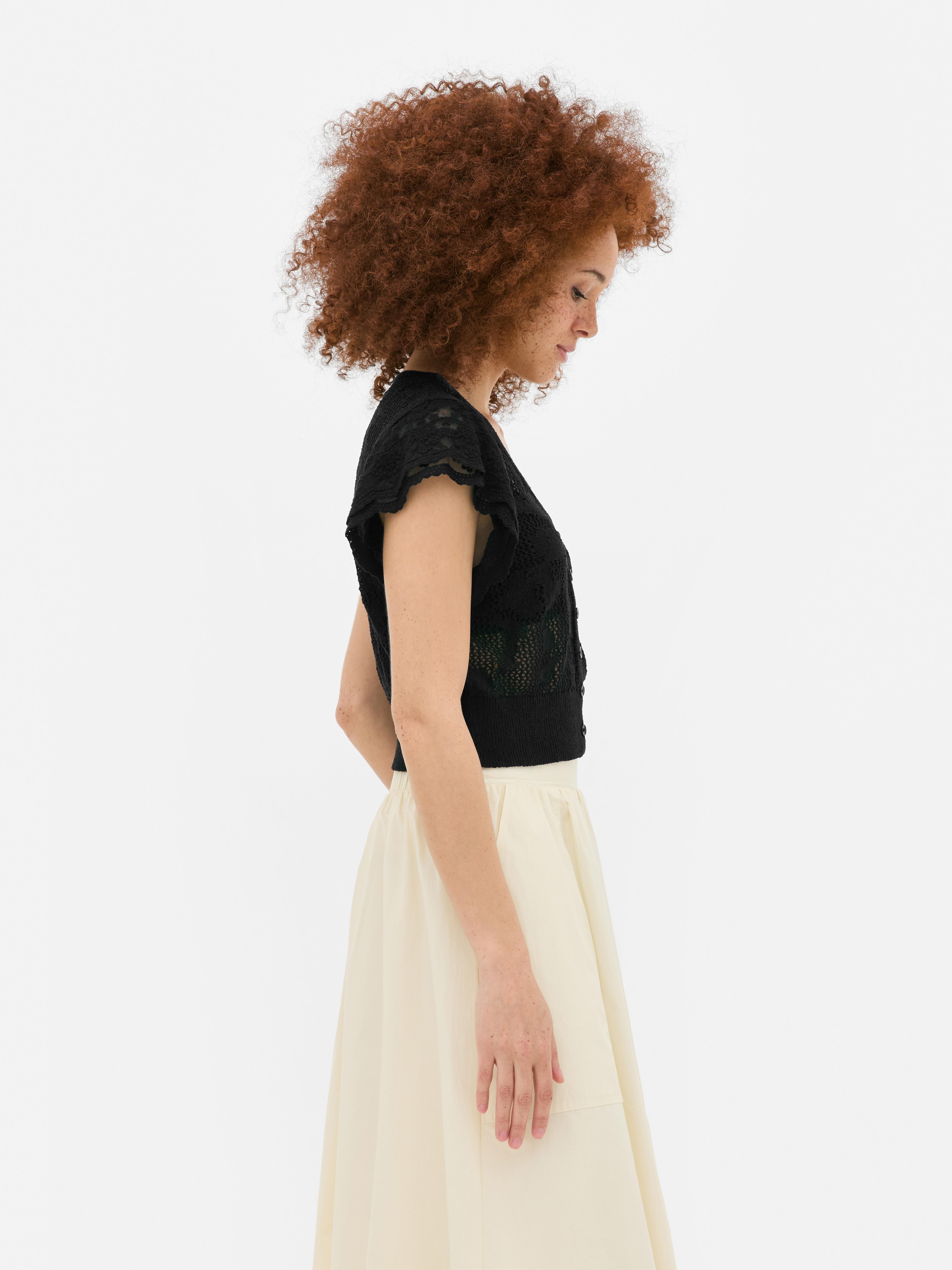 Kort vest met ruchemouwen