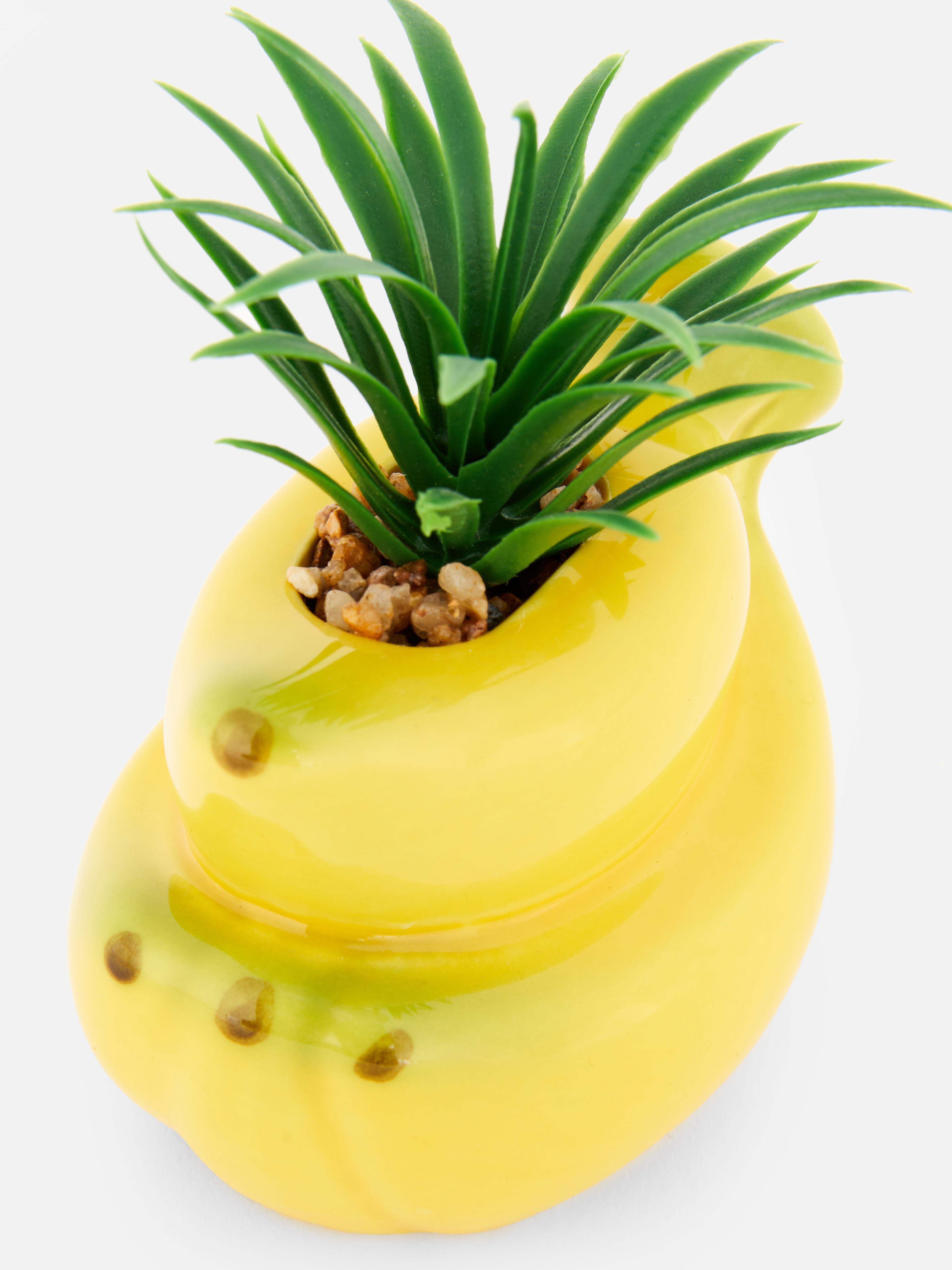 Faux Succulent In Banana Shaped Pot