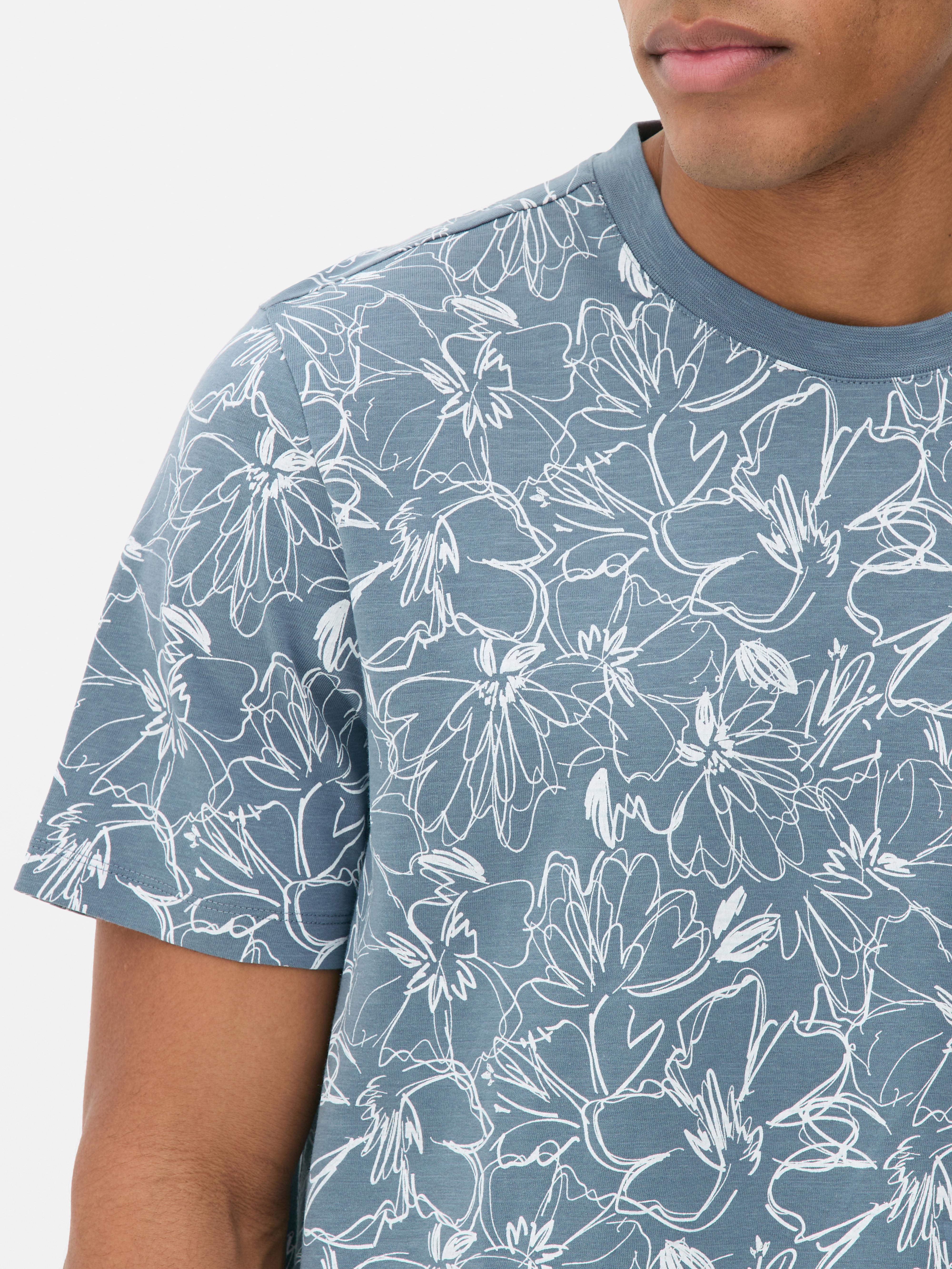 T-shirt à manches courtes et esquisse florale