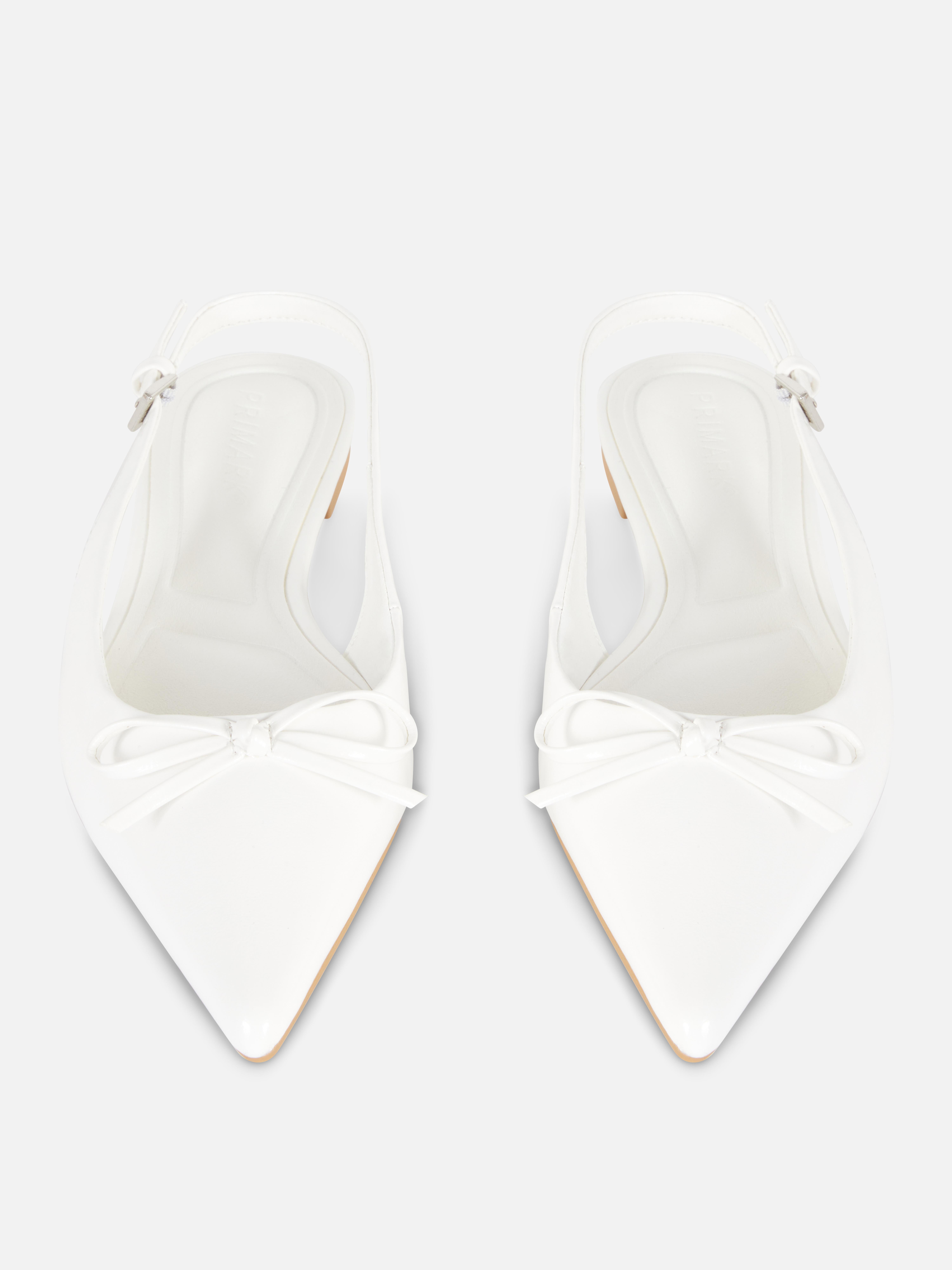 Slingbacks met puntige neus en strikje