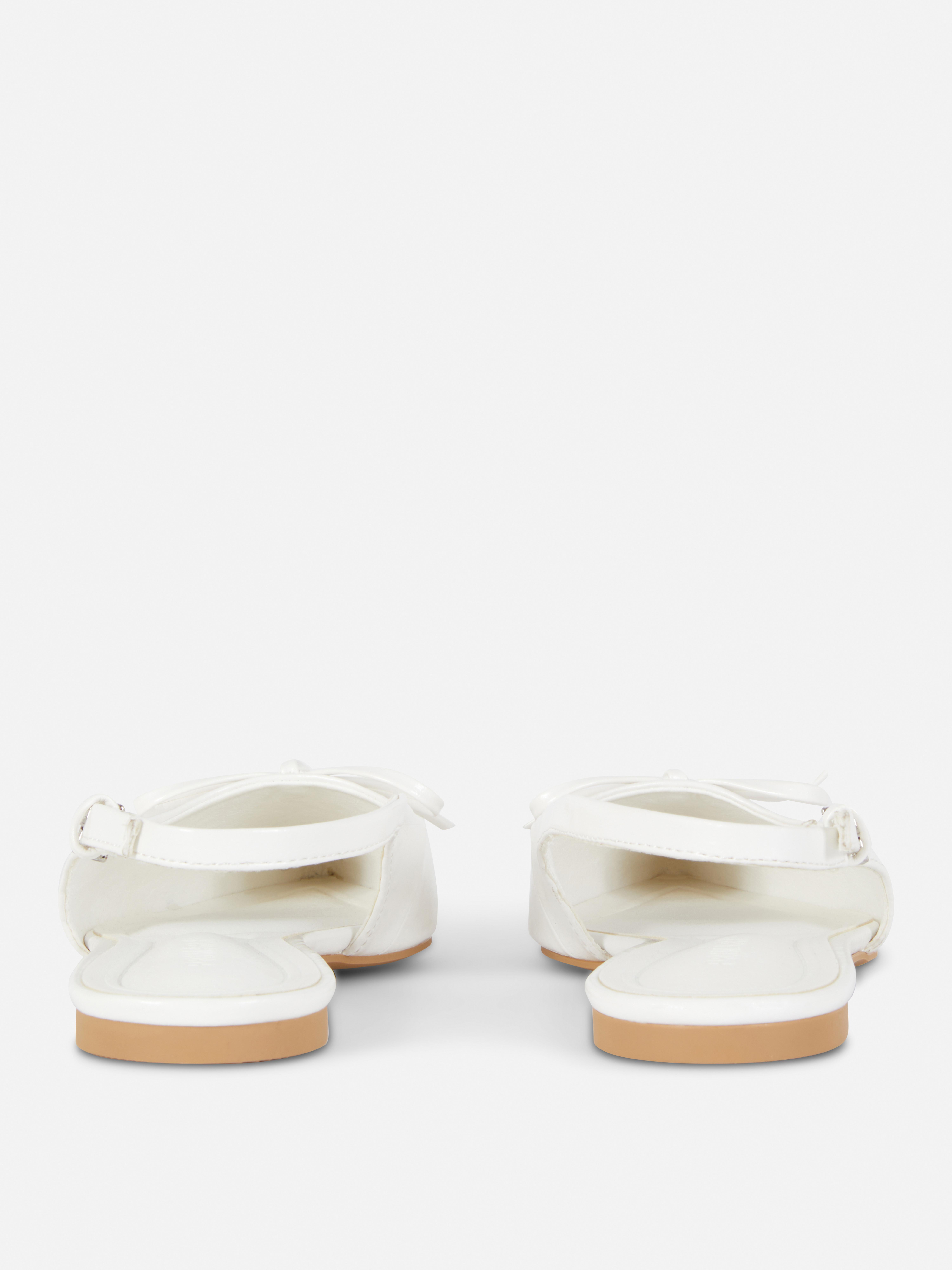 Slingbacks met puntige neus en strikje
