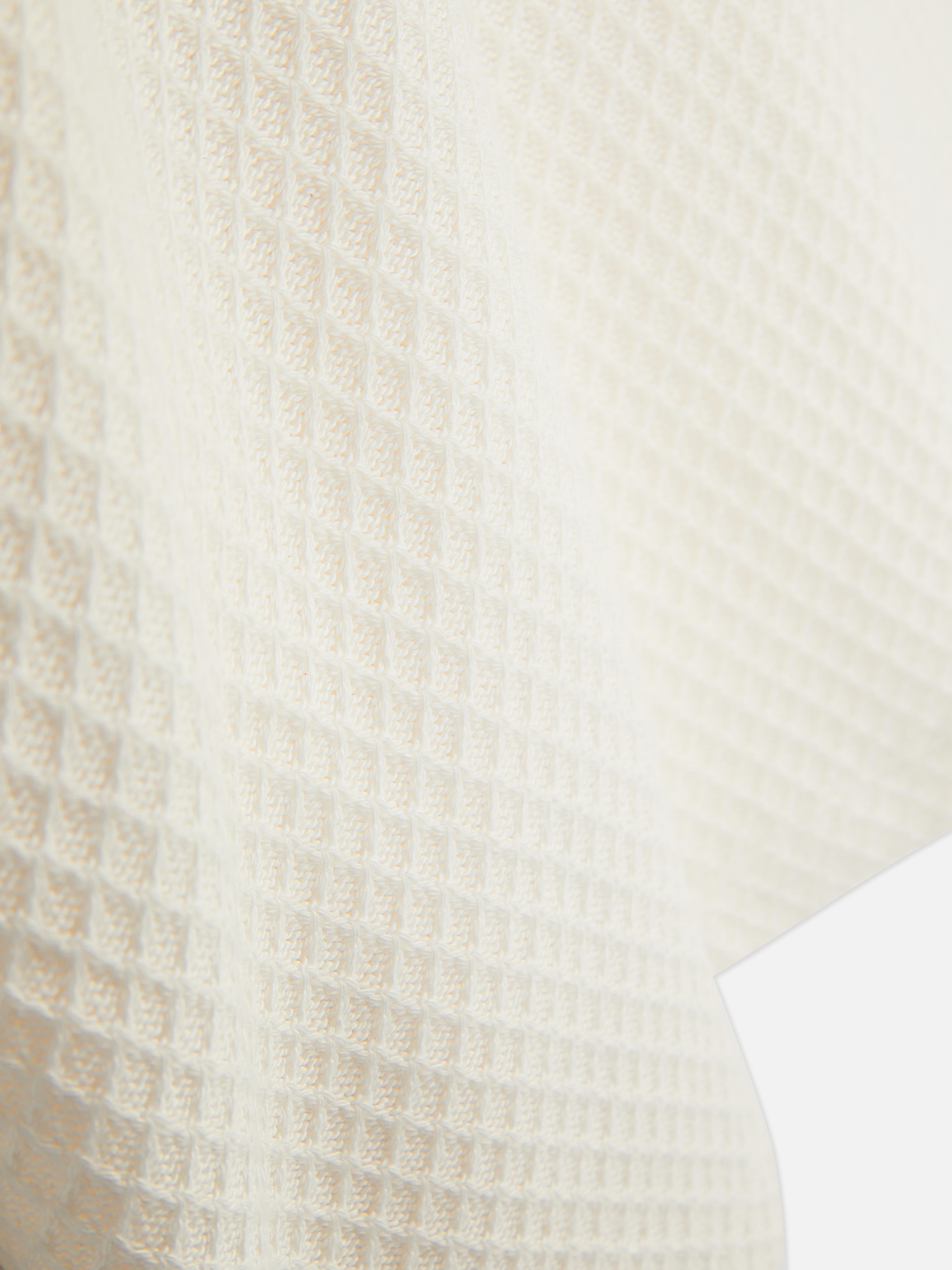 Polo en maille texturée