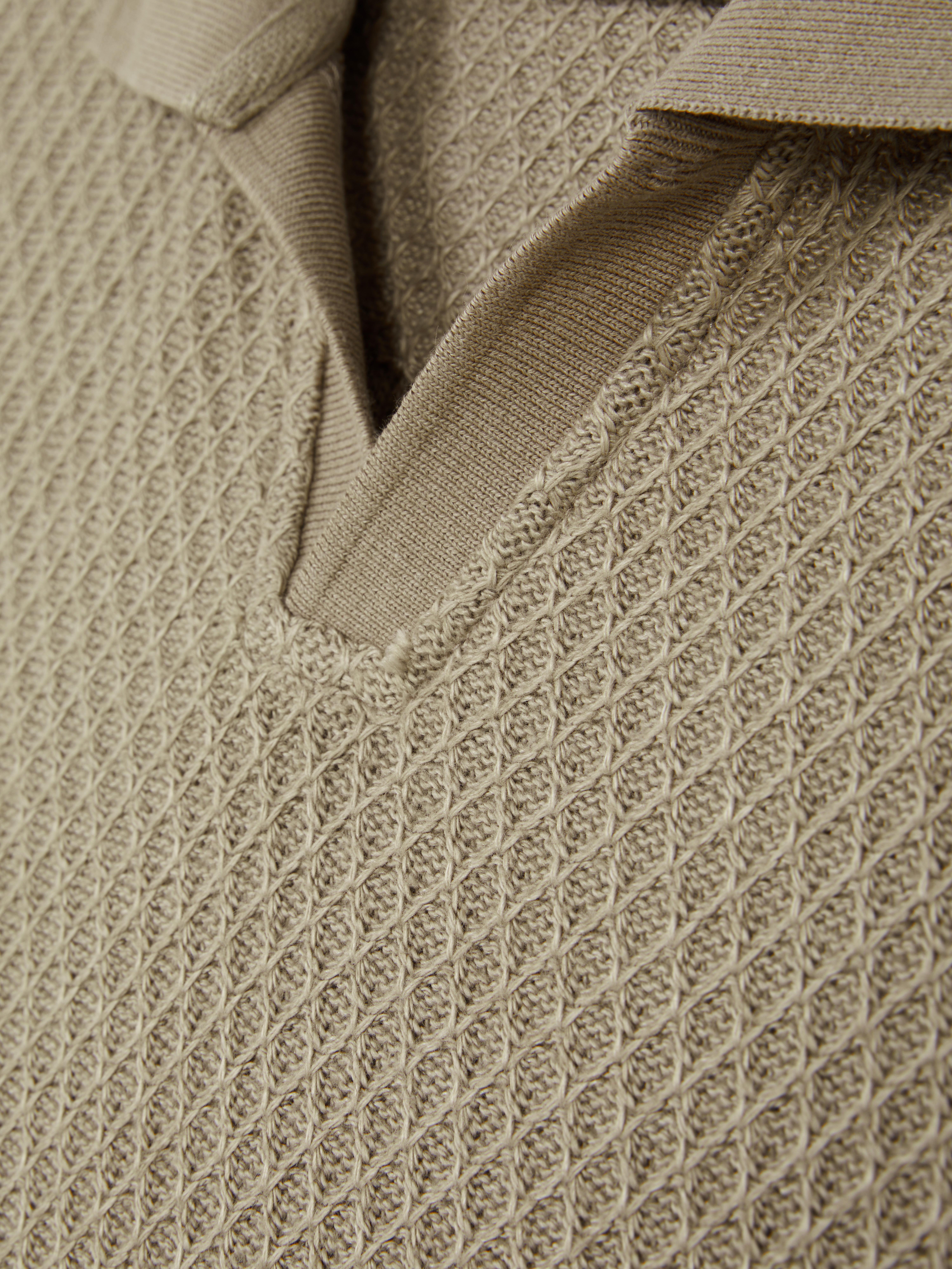 Polo en maille texturée