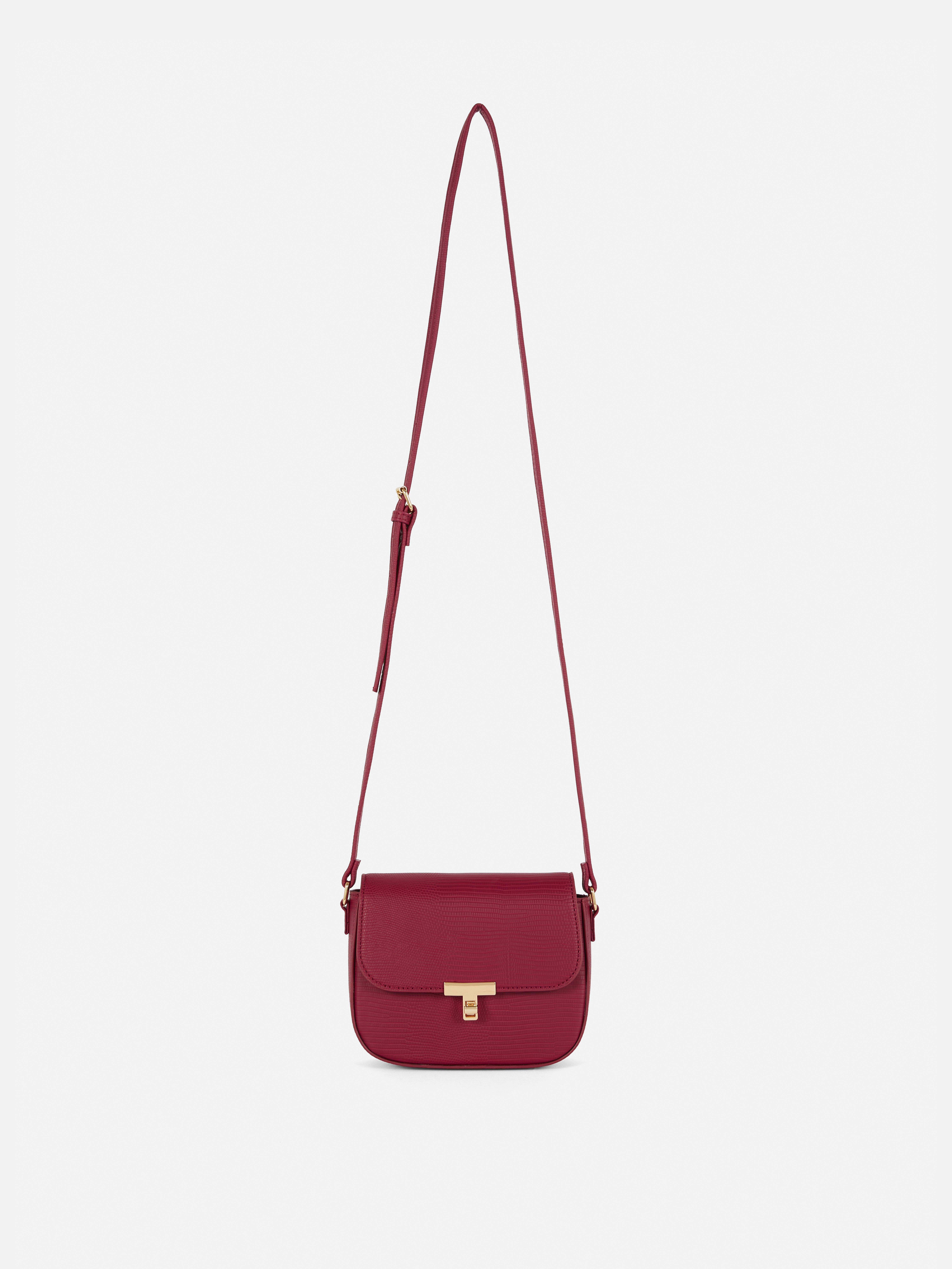 Mini crossbody kabelka s klopovým uzáverom