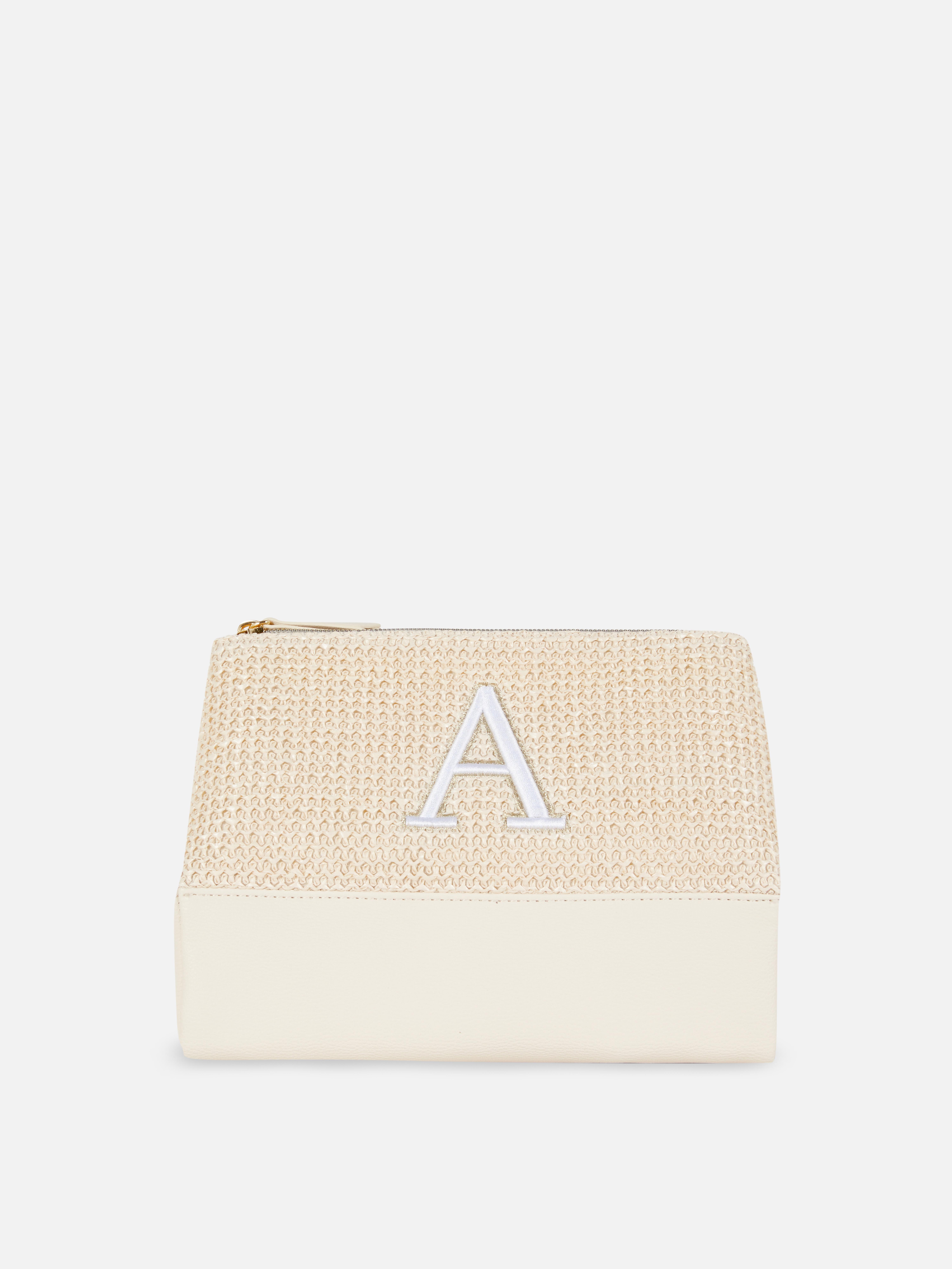 Trousse maquillage pliable en raphia à initiale