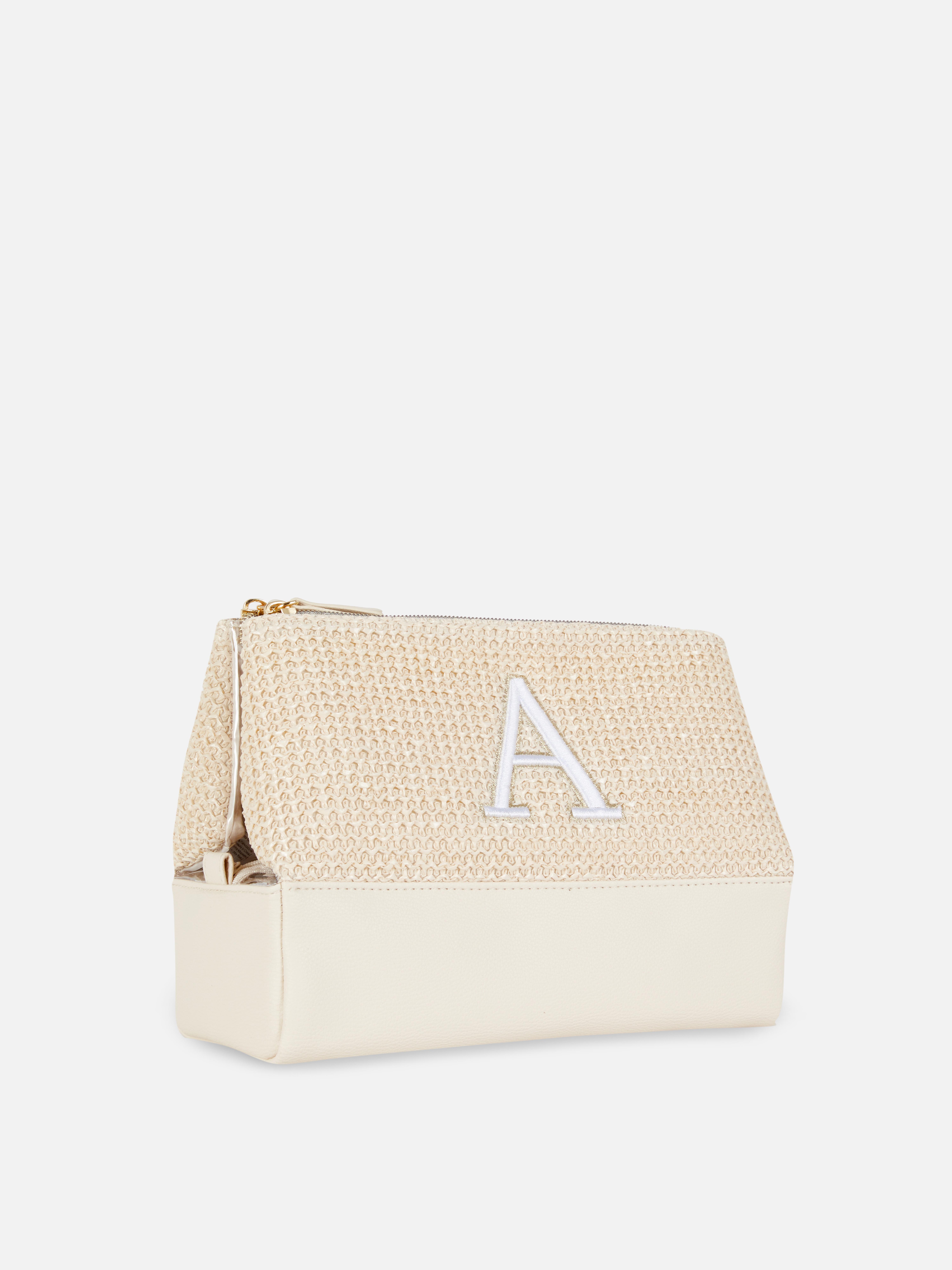 Trousse maquillage pliable en raphia à initiale
