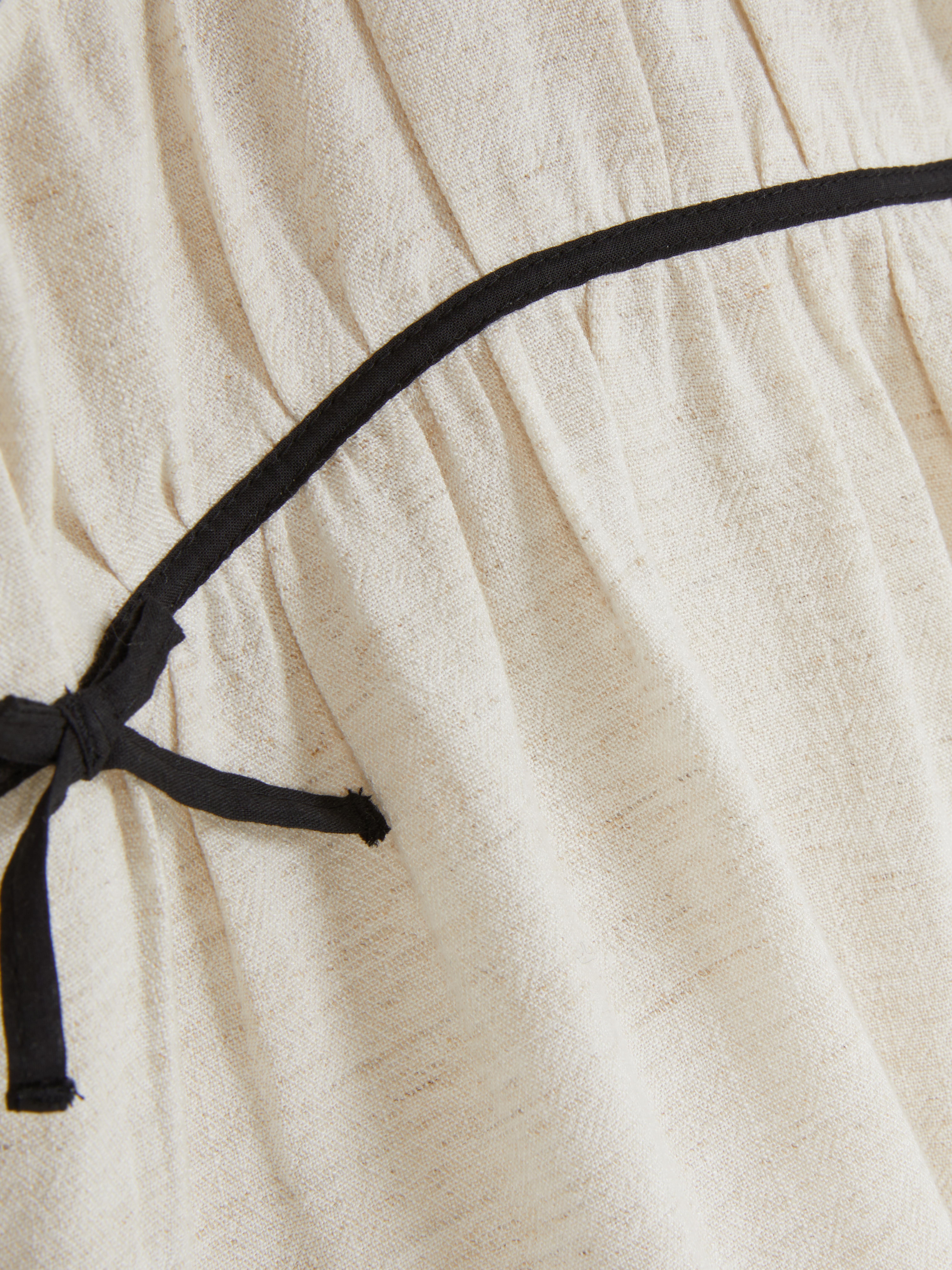 Ärmellose Bluse mit Schleife