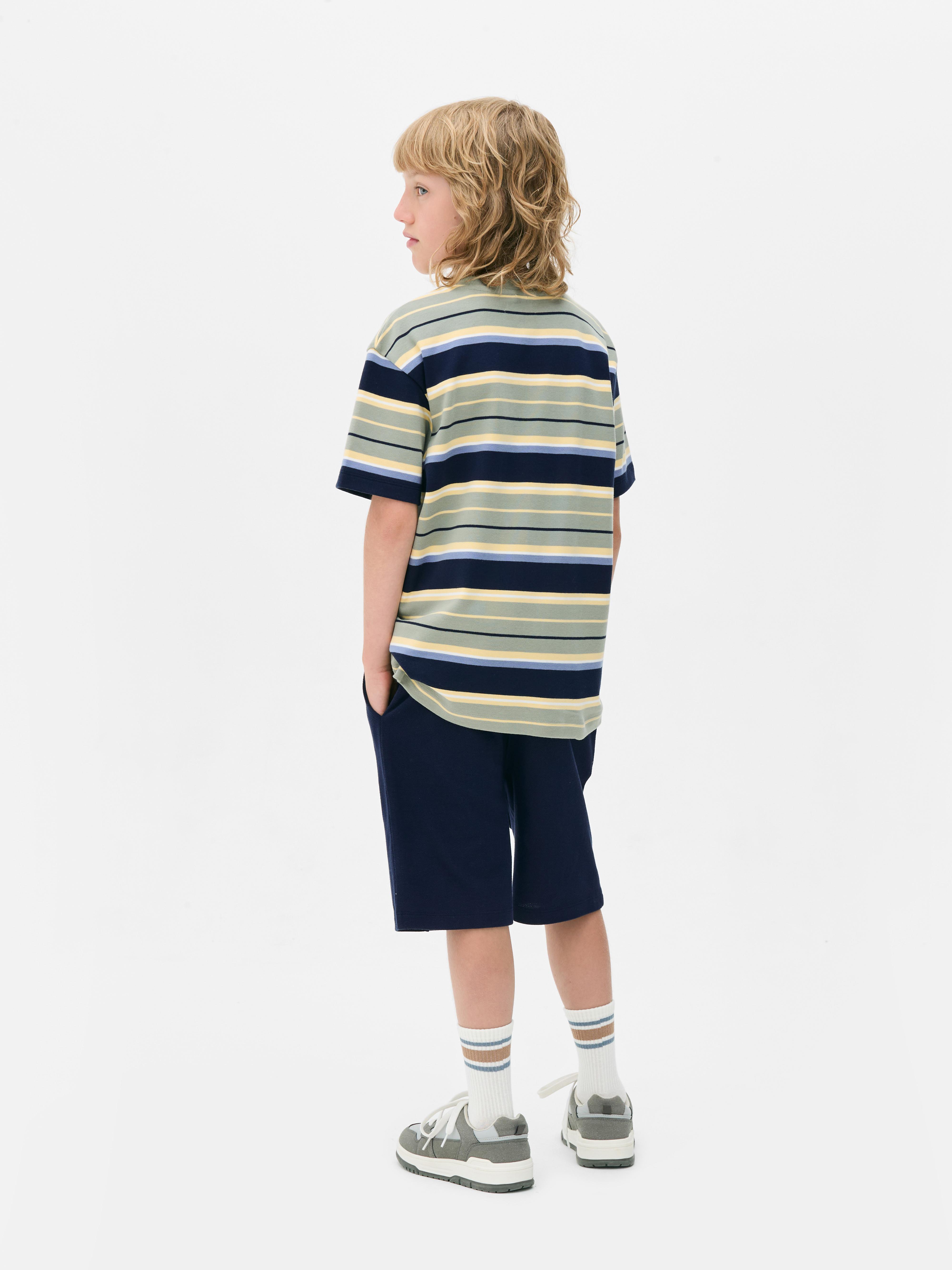 7- 15 ani | Set cu tricou în dungi și pantaloni scurți