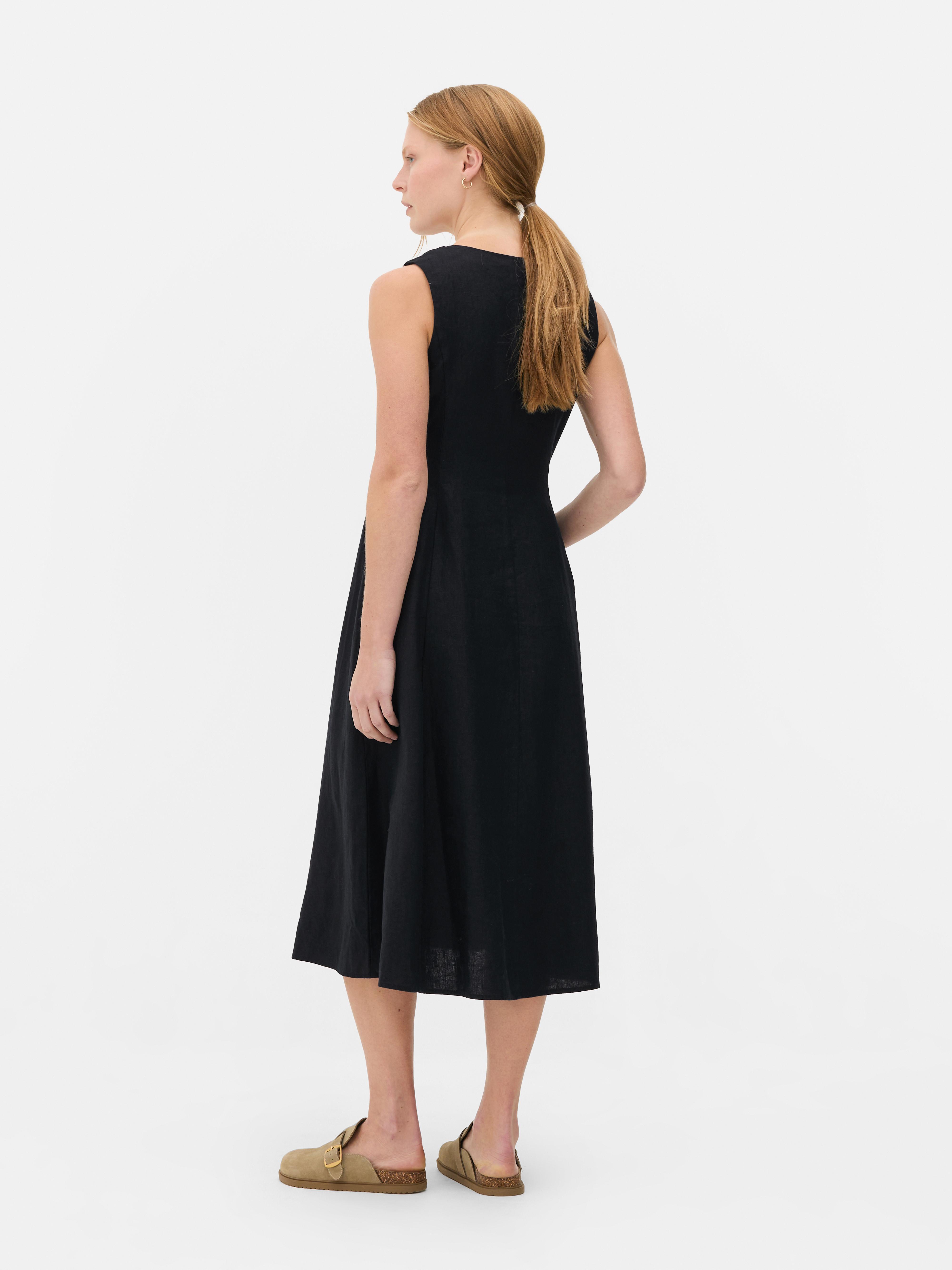 Mouwloze linnen jurk met V-hals The Edit