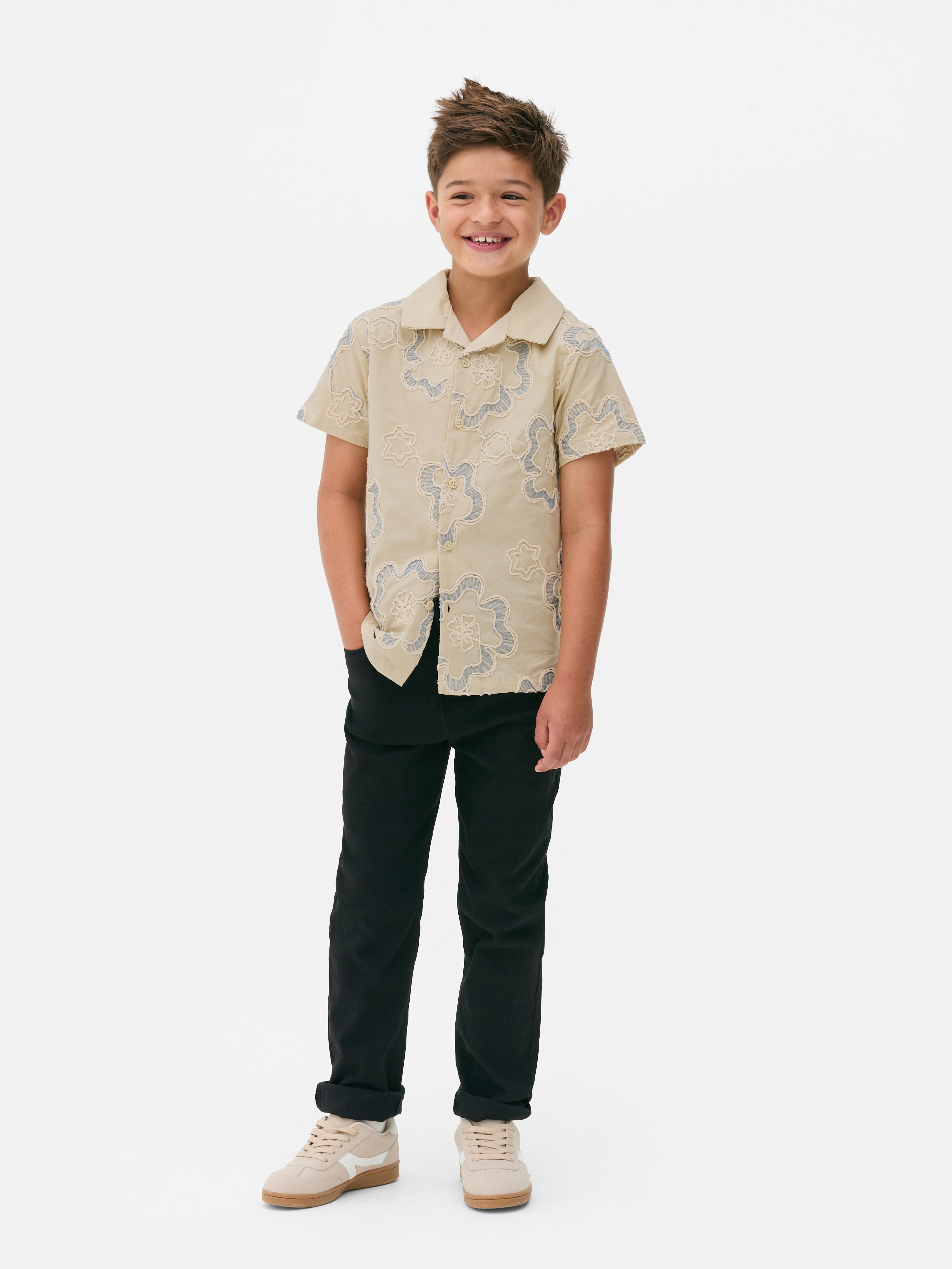 Camisa de botones bordada con flores