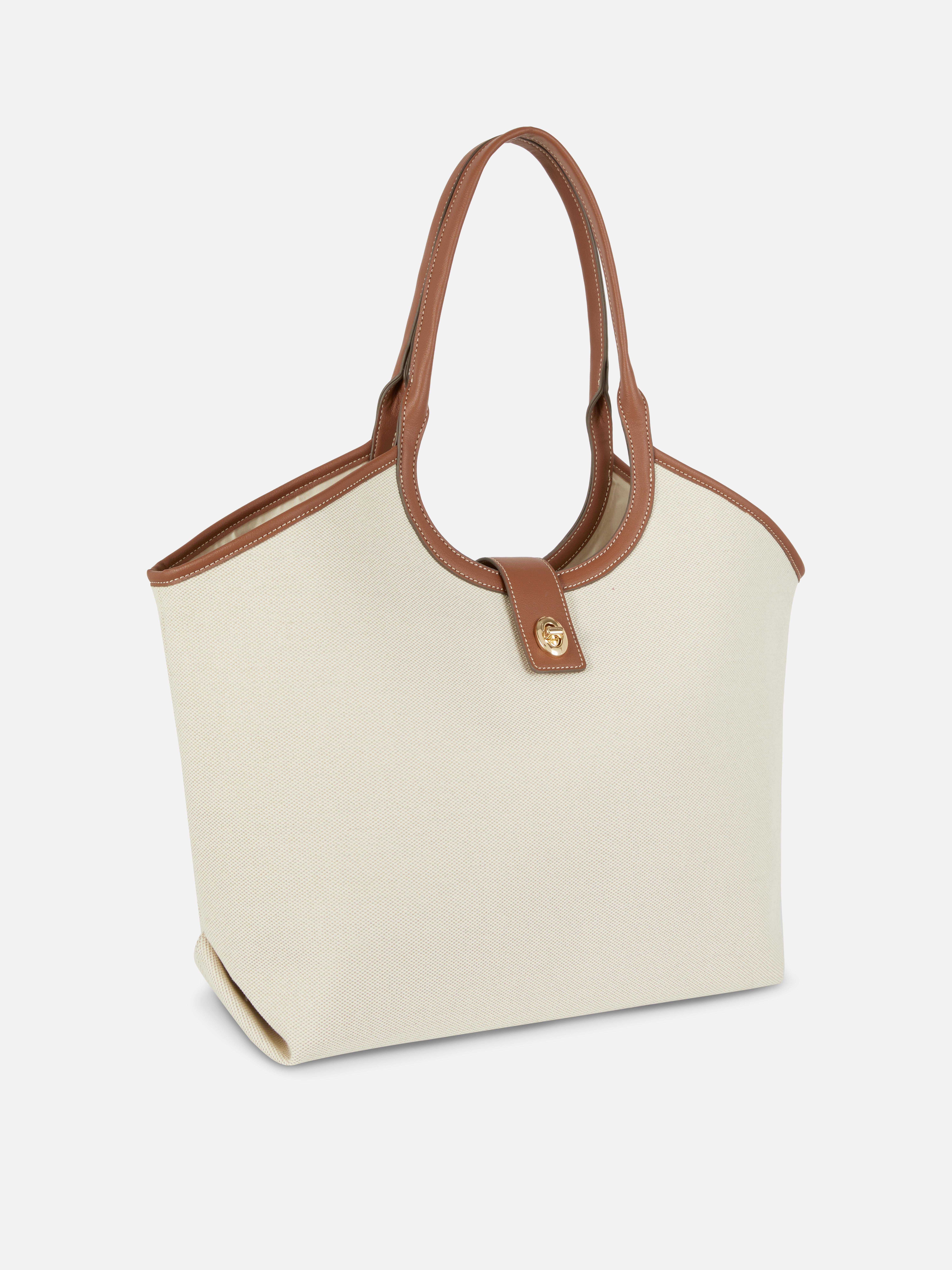 Fourre-tout à finitions en simili cuir