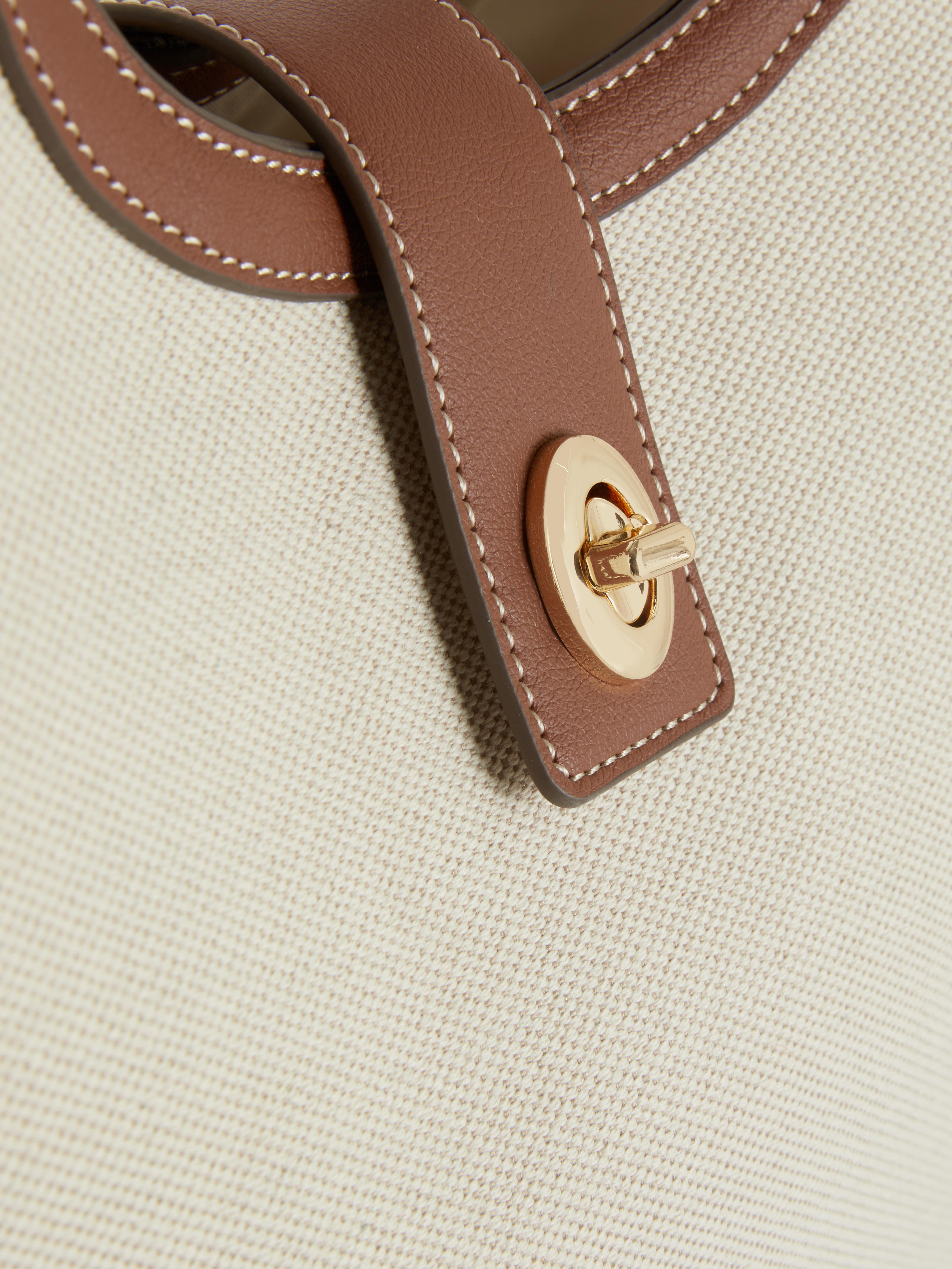 Fourre-tout à finitions en simili cuir