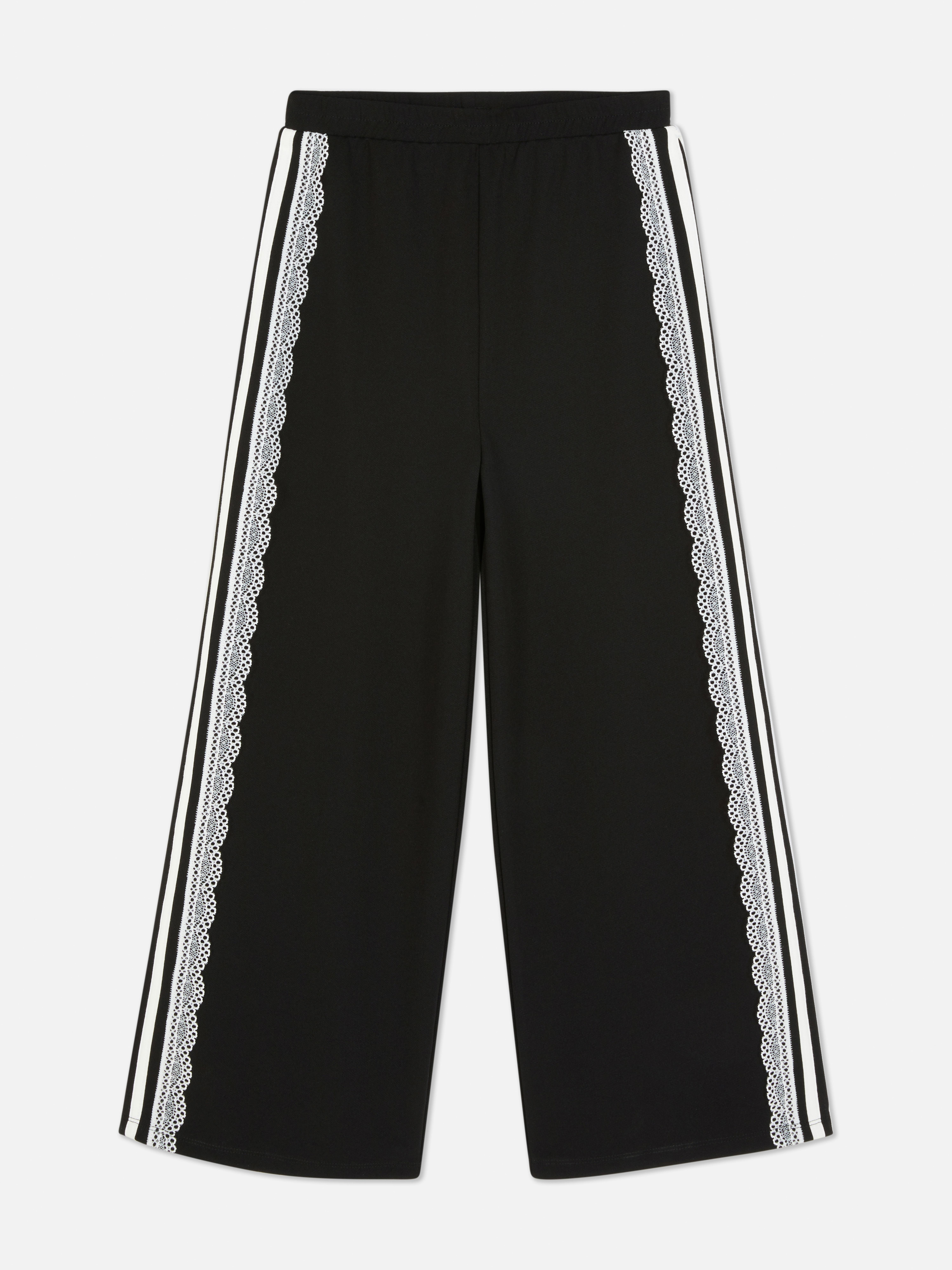 Pantalones con rayas laterales y encaje