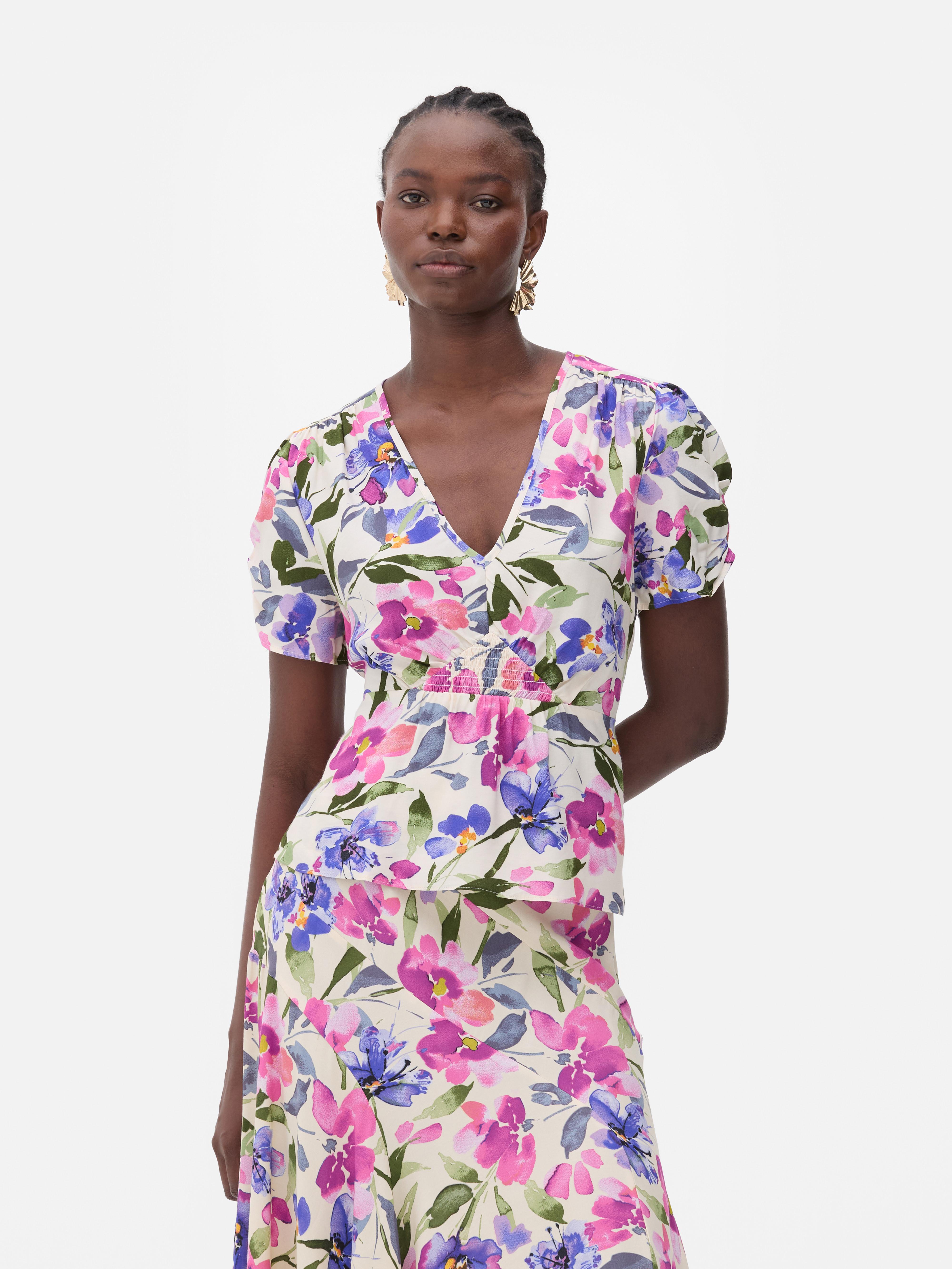 Camicetta drappeggiata con volant