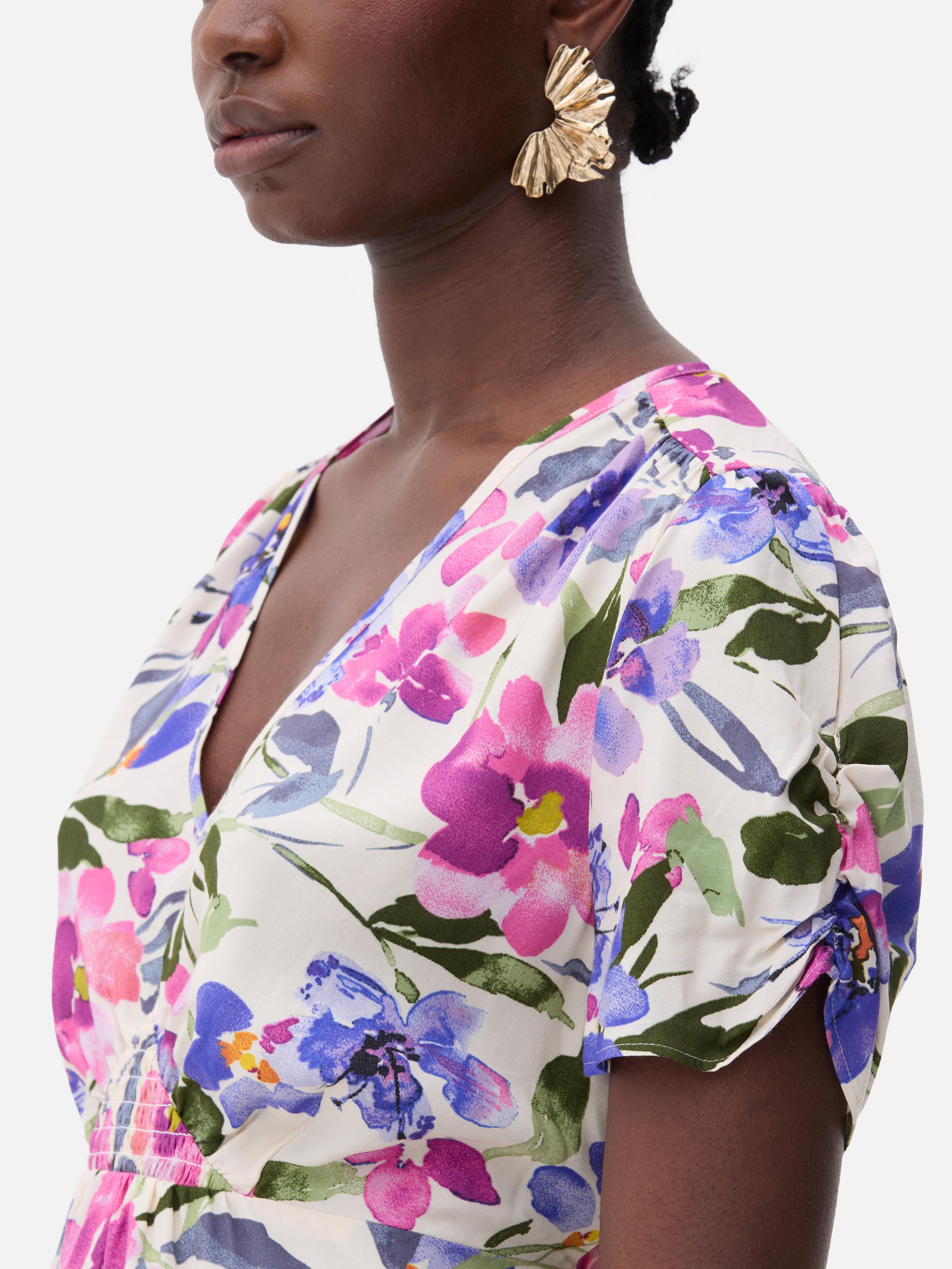 Camicetta drappeggiata con volant