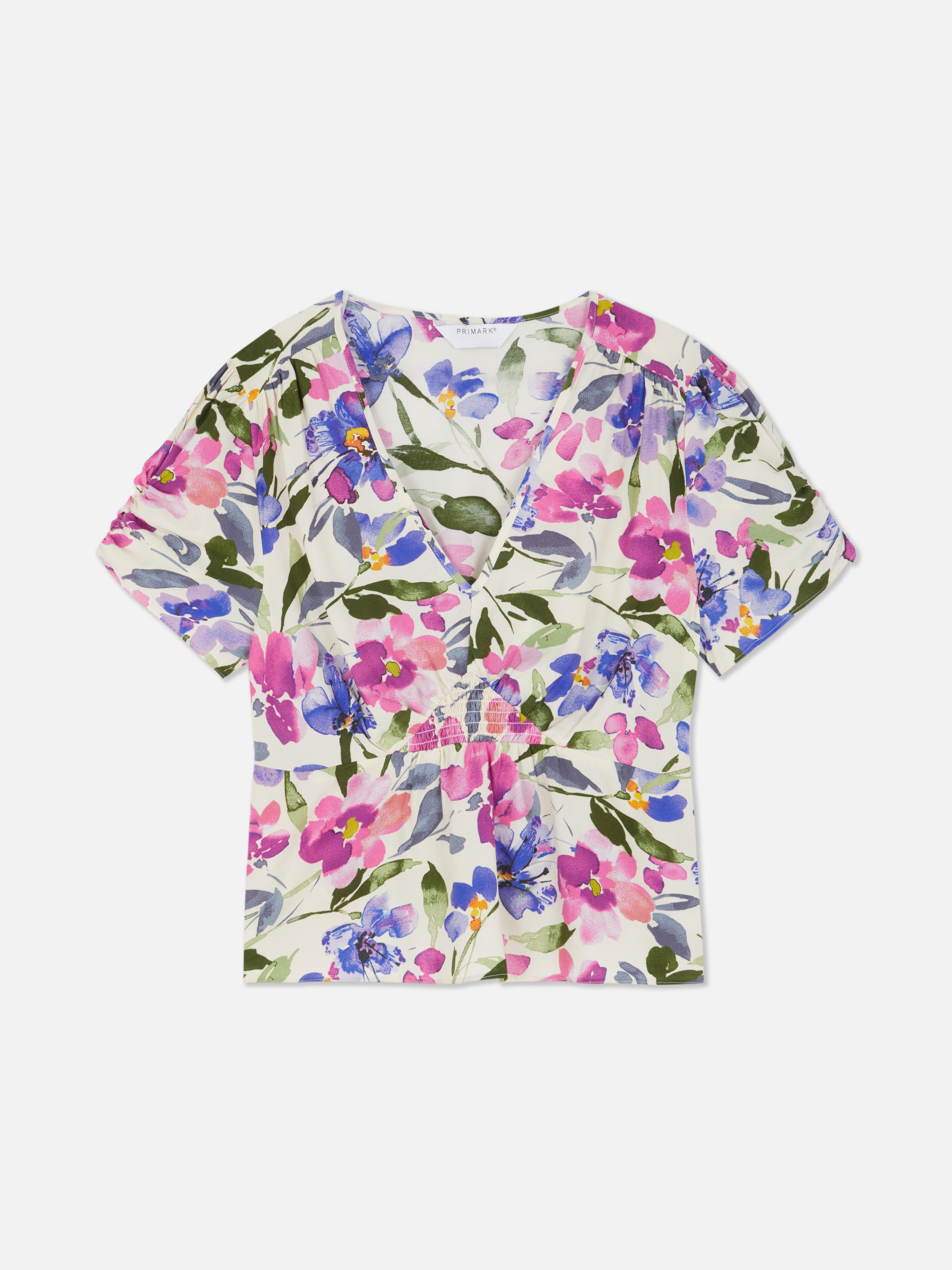 Camicetta drappeggiata con volant