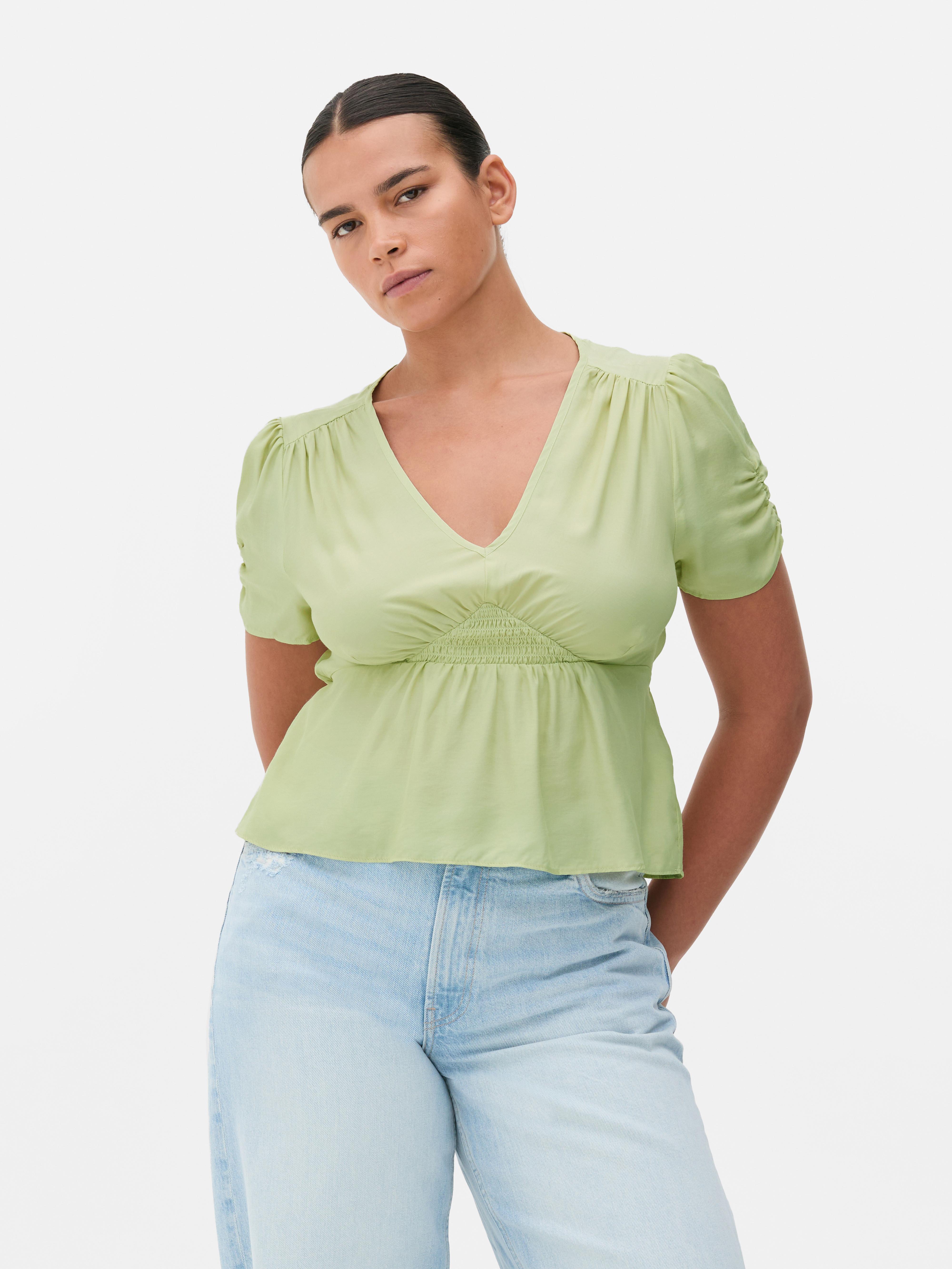 Camicetta drappeggiata con volant