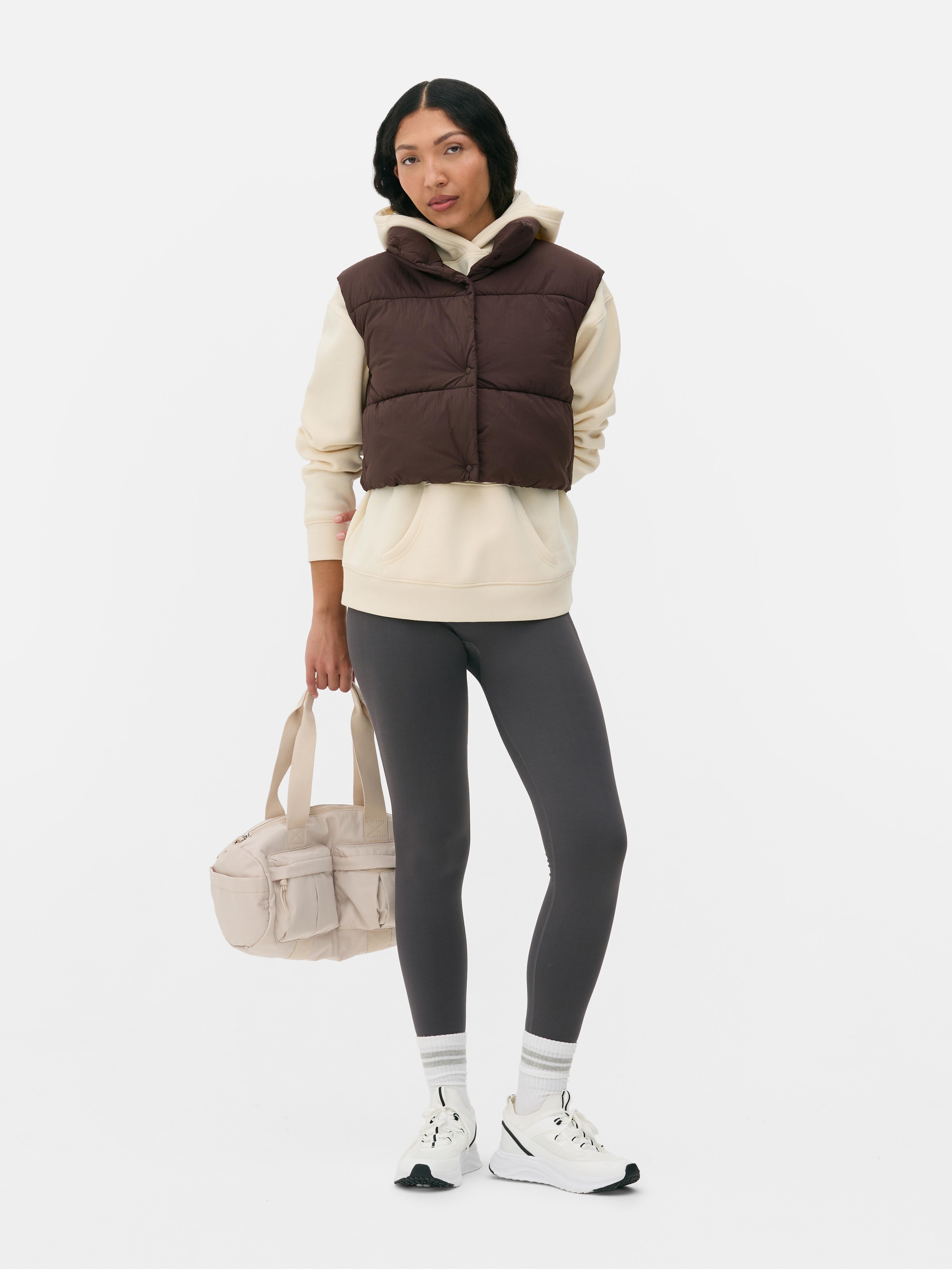 Doorgestikte korte bodywarmer