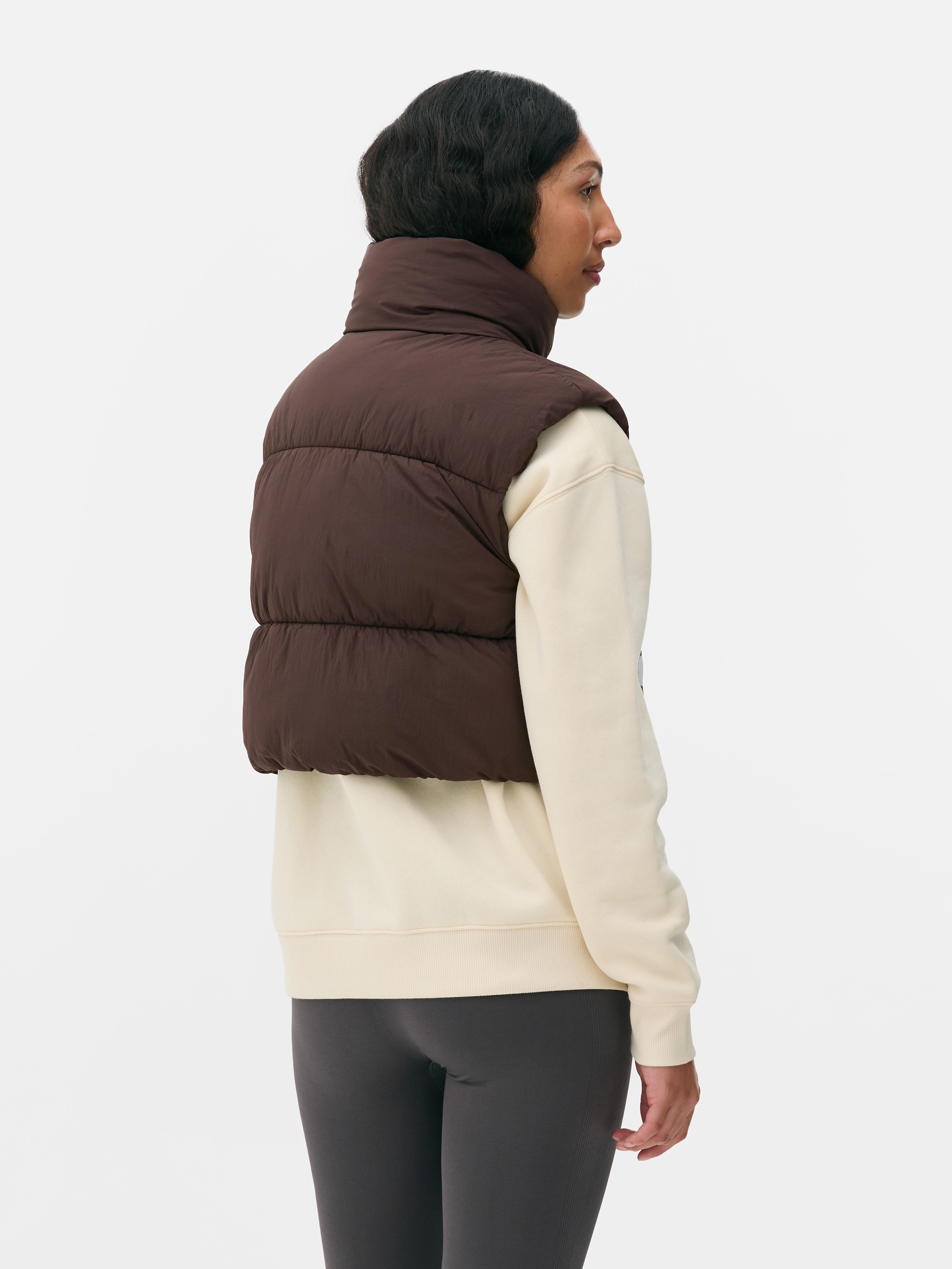 Doorgestikte korte bodywarmer