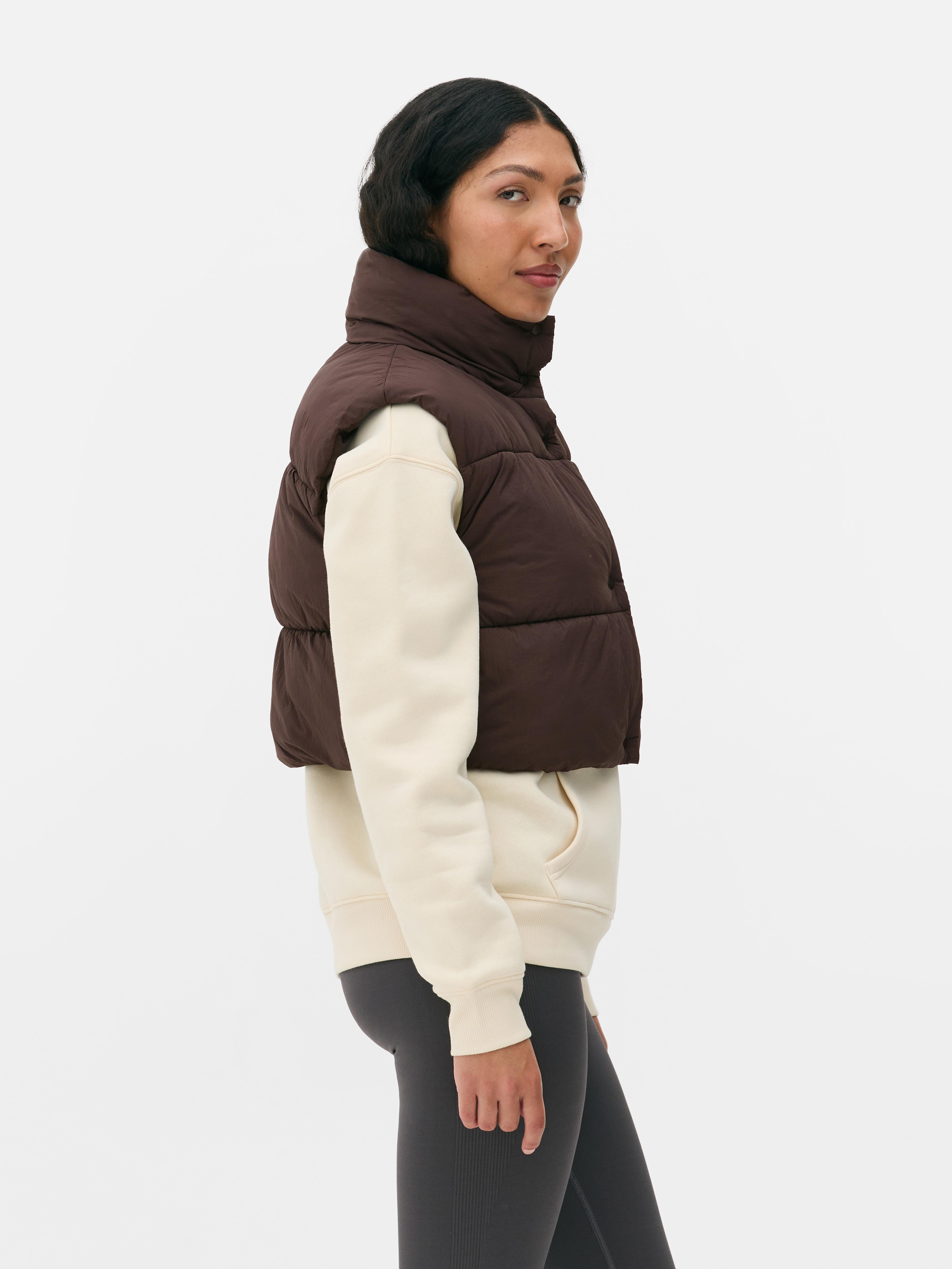 Doorgestikte korte bodywarmer