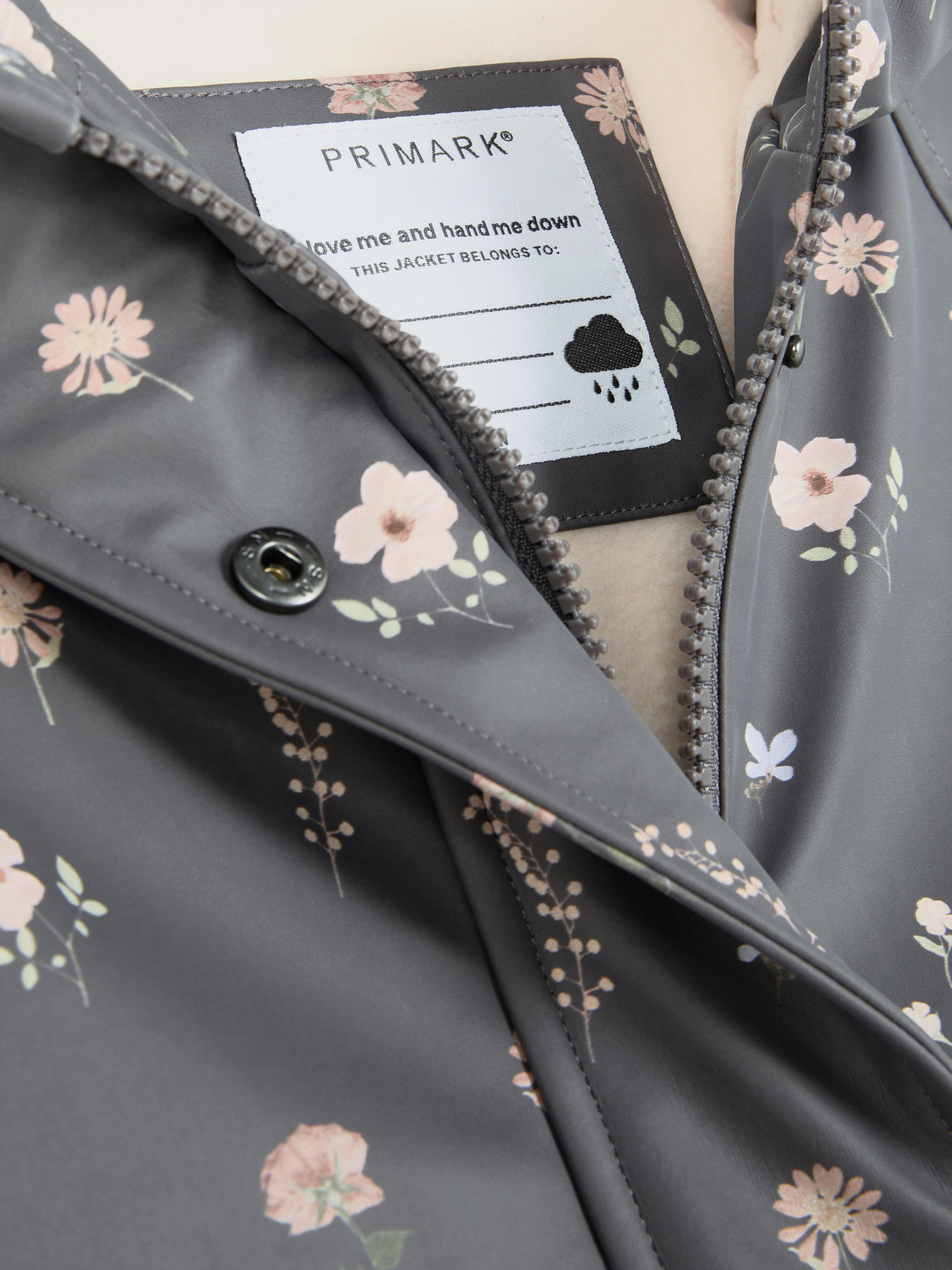 Regenjas met capuchon en bloemenprint
