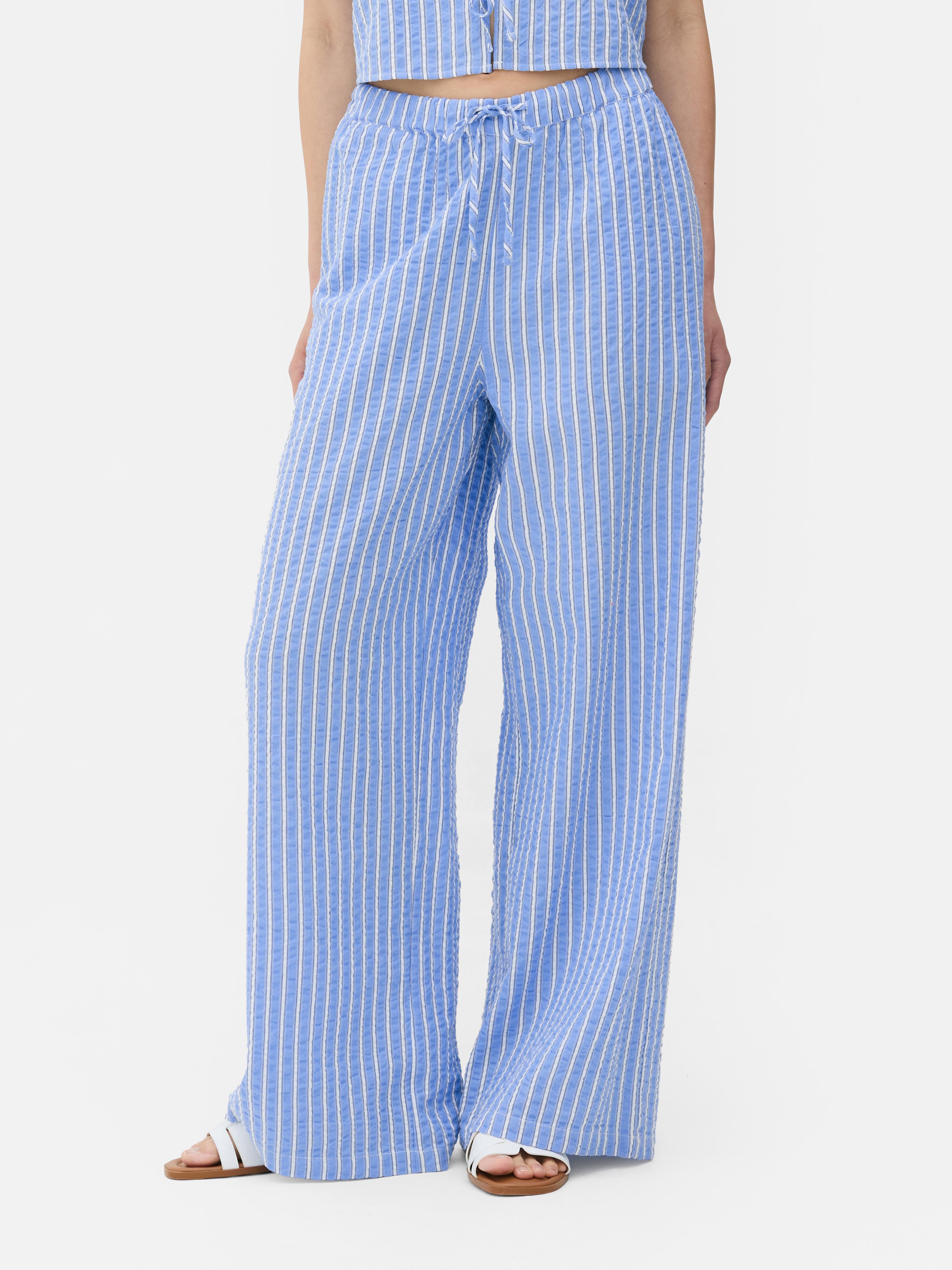 Pantaloni în dungi din material încrețit