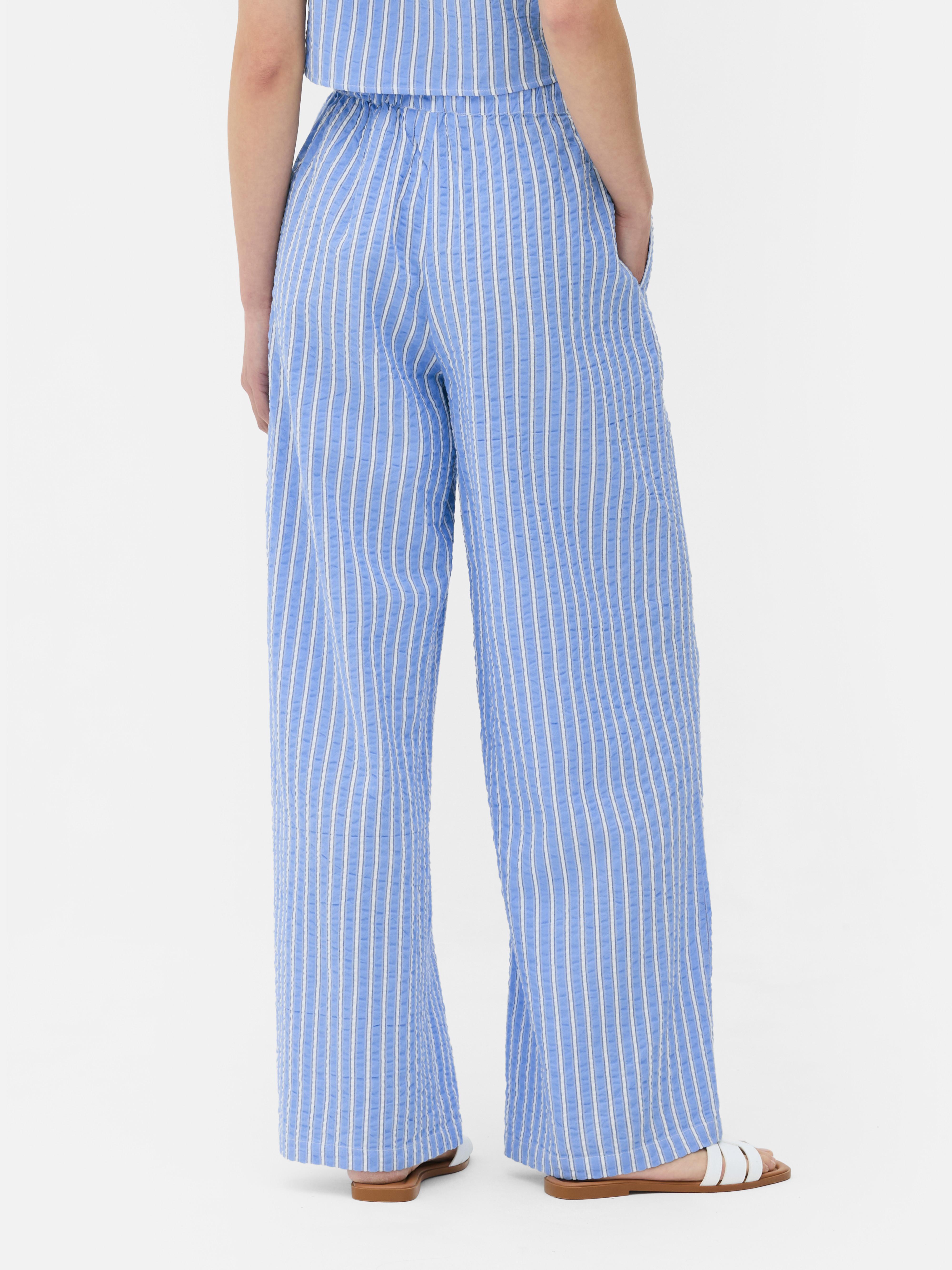 Pantaloni în dungi din material încrețit