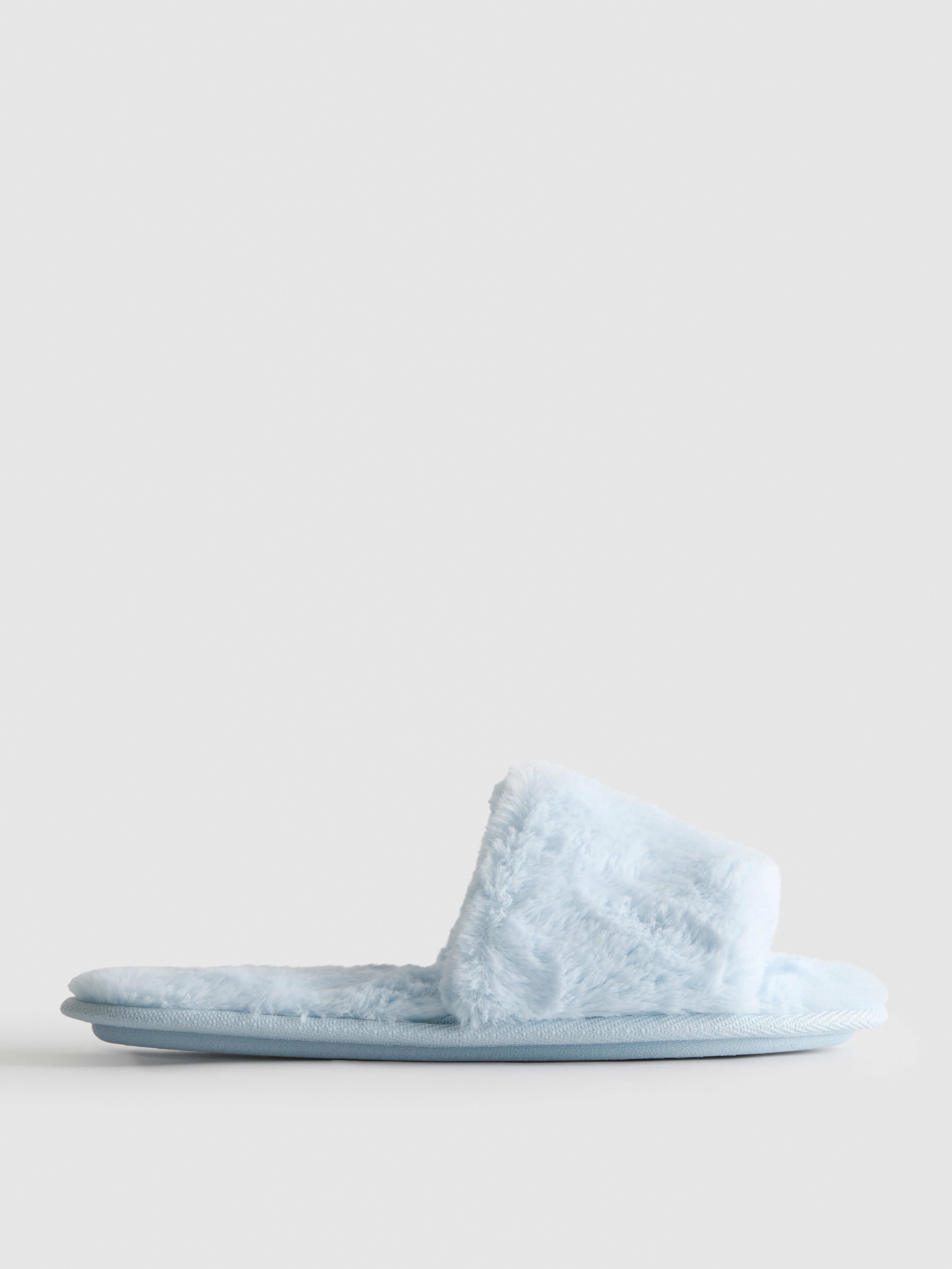 Chaussons duveteux à brides croisées Bleu clair