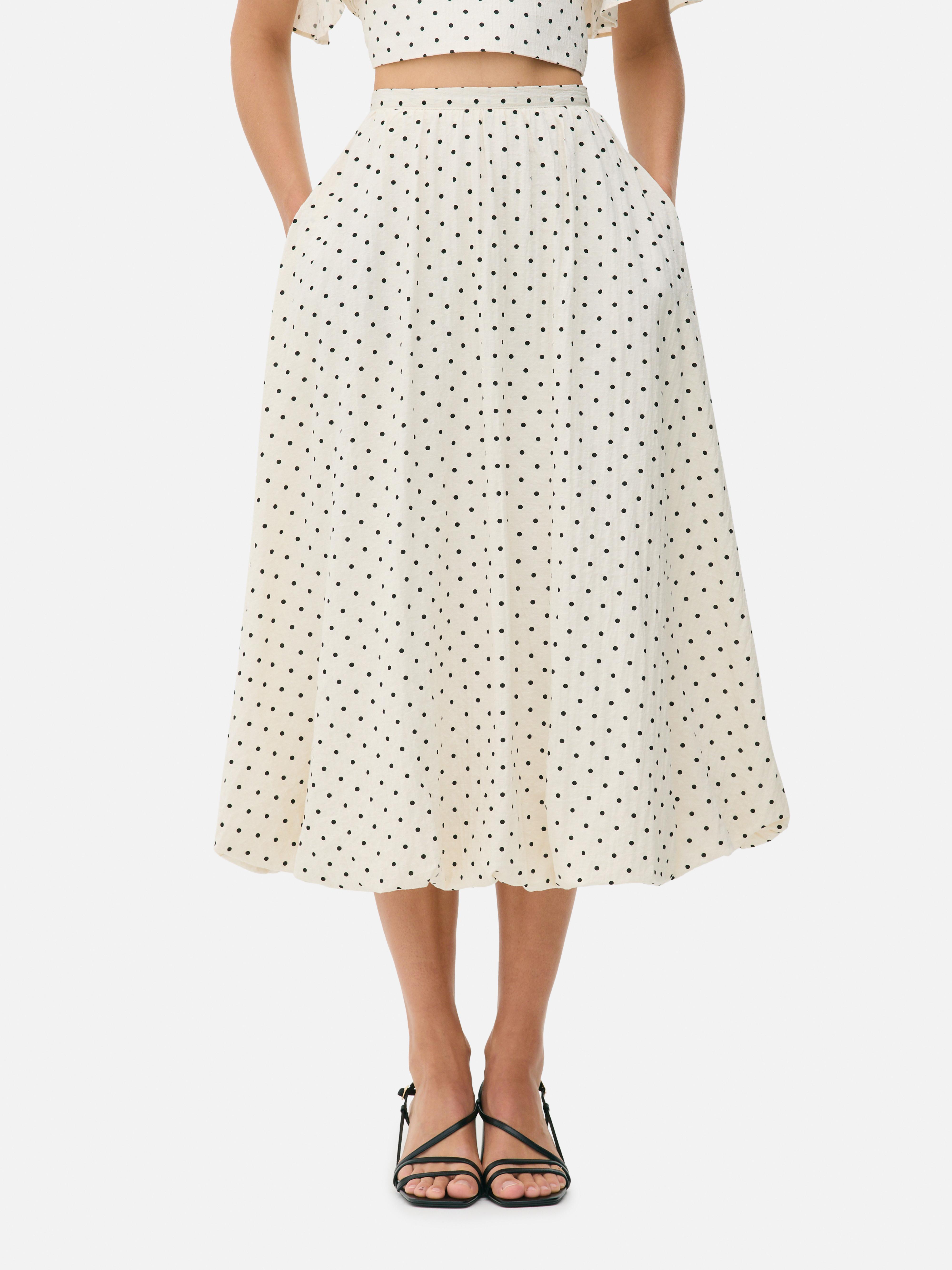 Falda midi con estampado de lunares