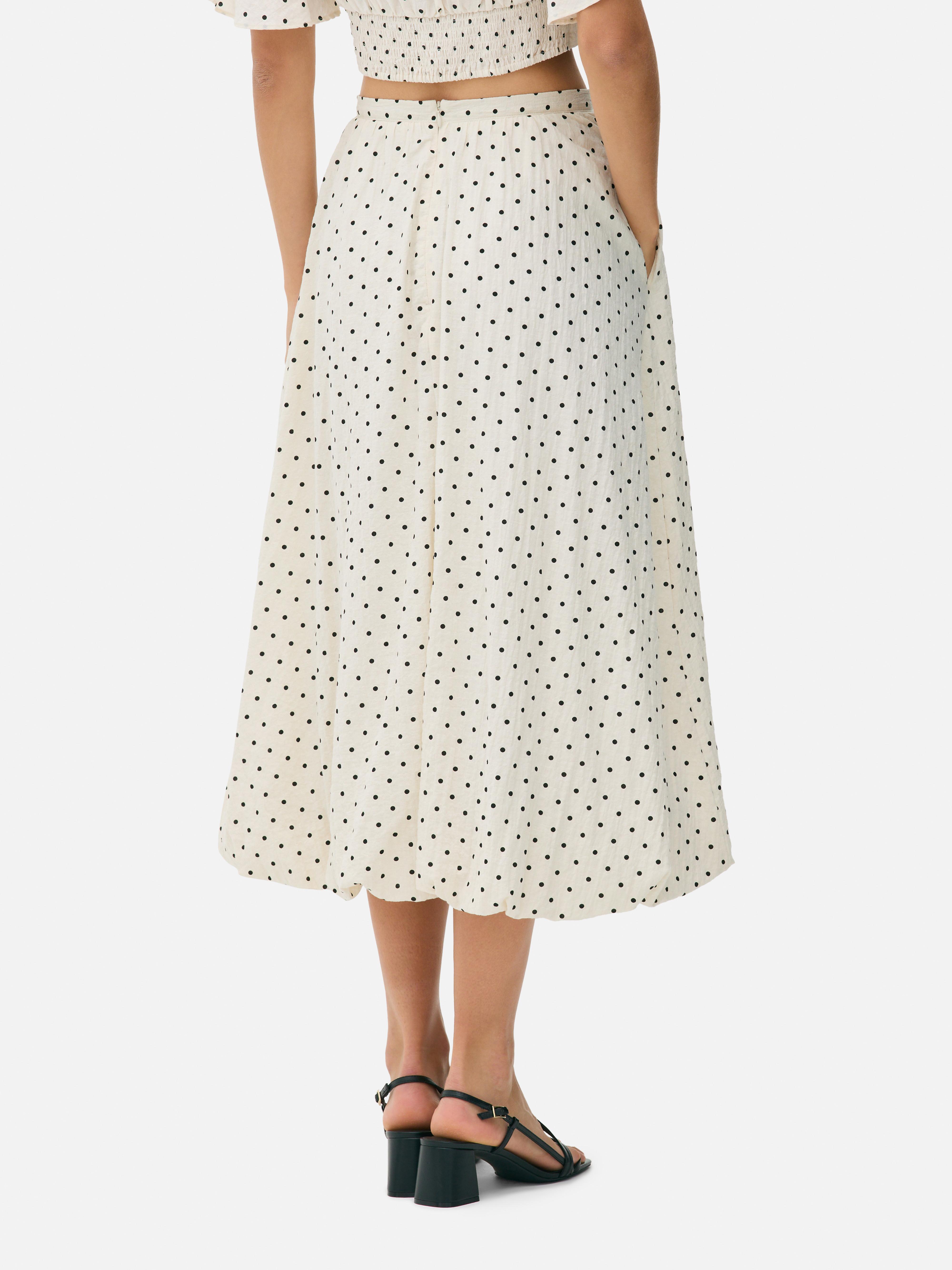 Falda midi con estampado de lunares