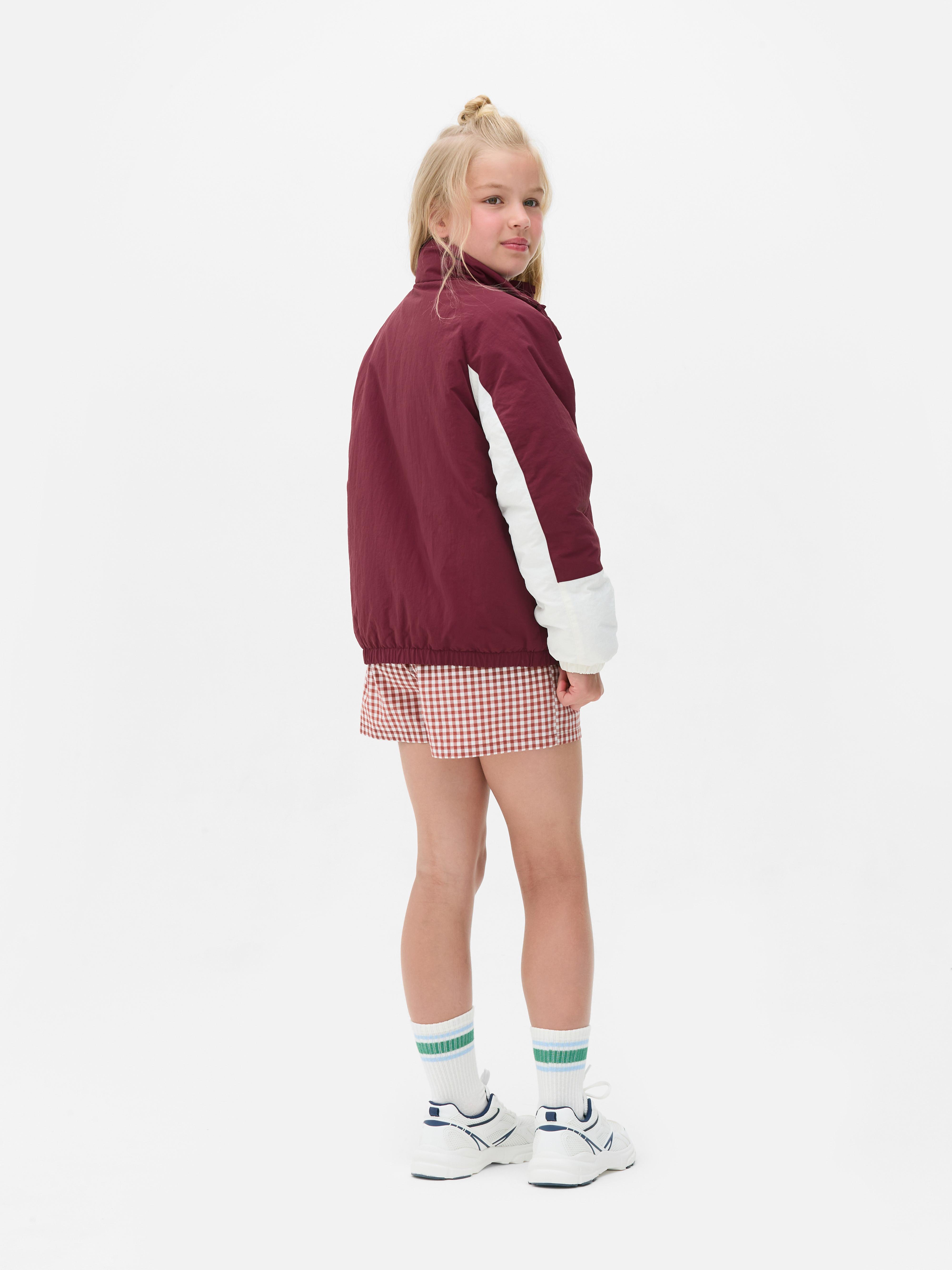 Chaqueta cortavientos con cuello chimenea