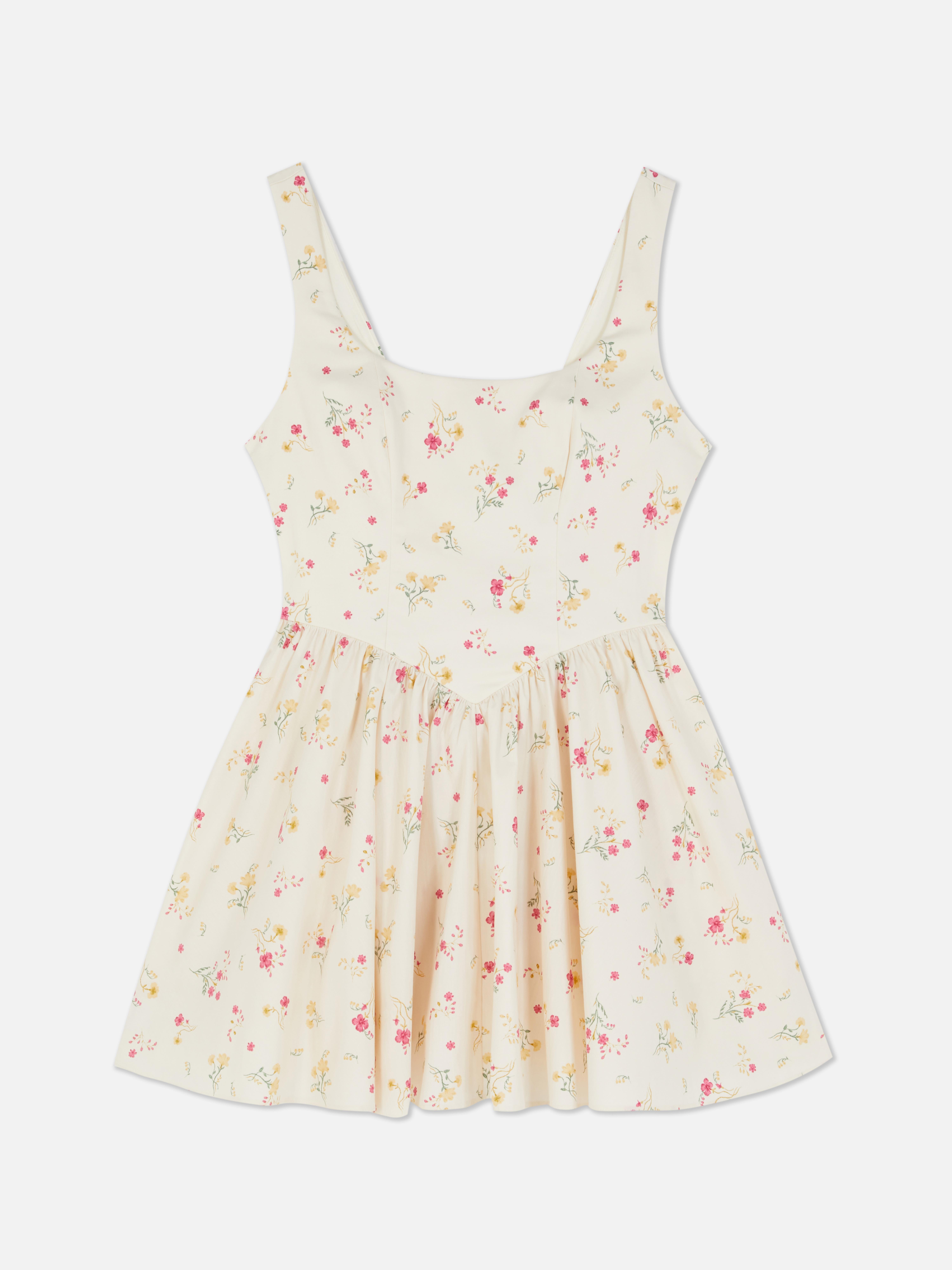 Mini robe style corset sans manches