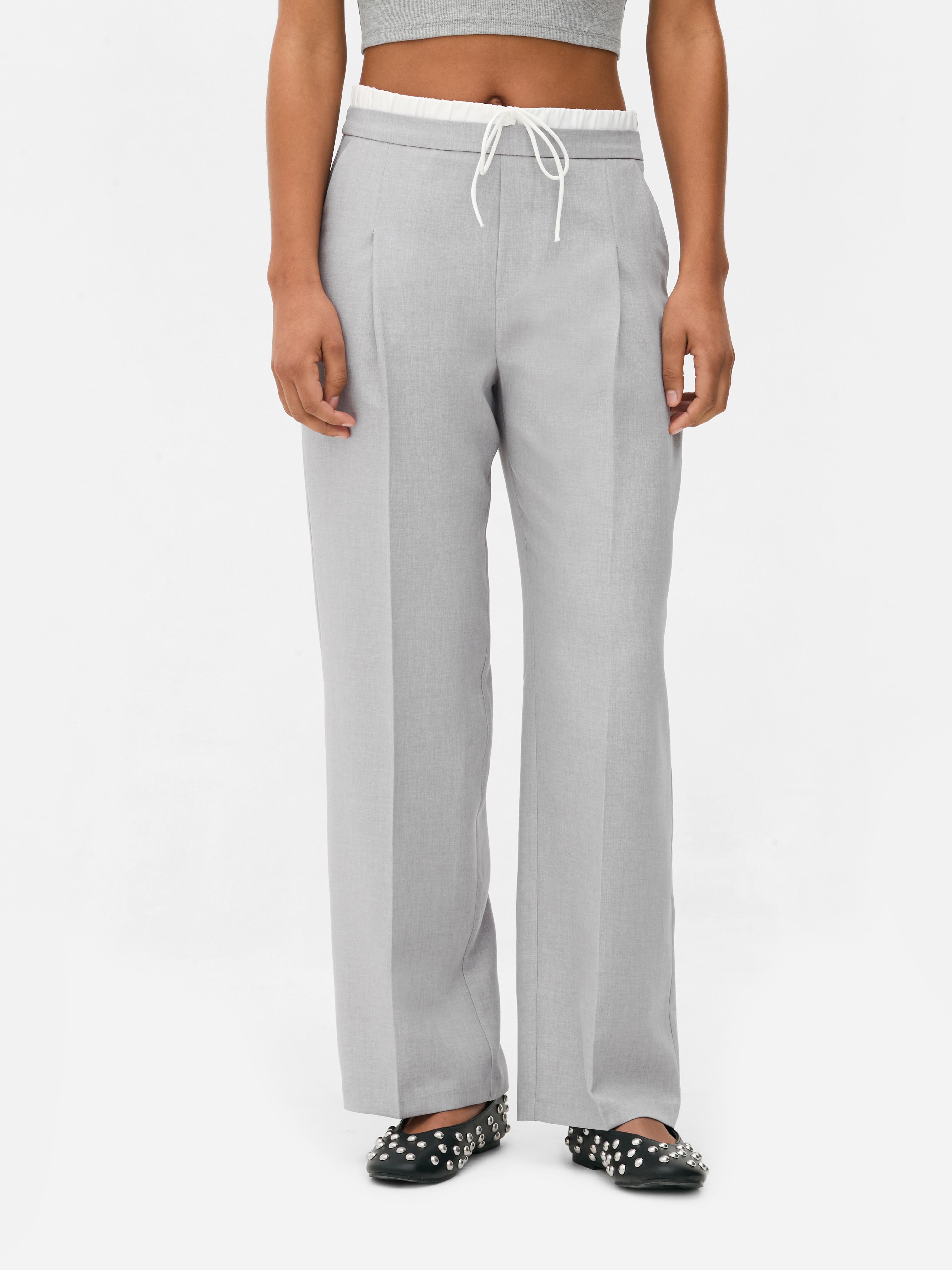 Broek met contrasterende taille