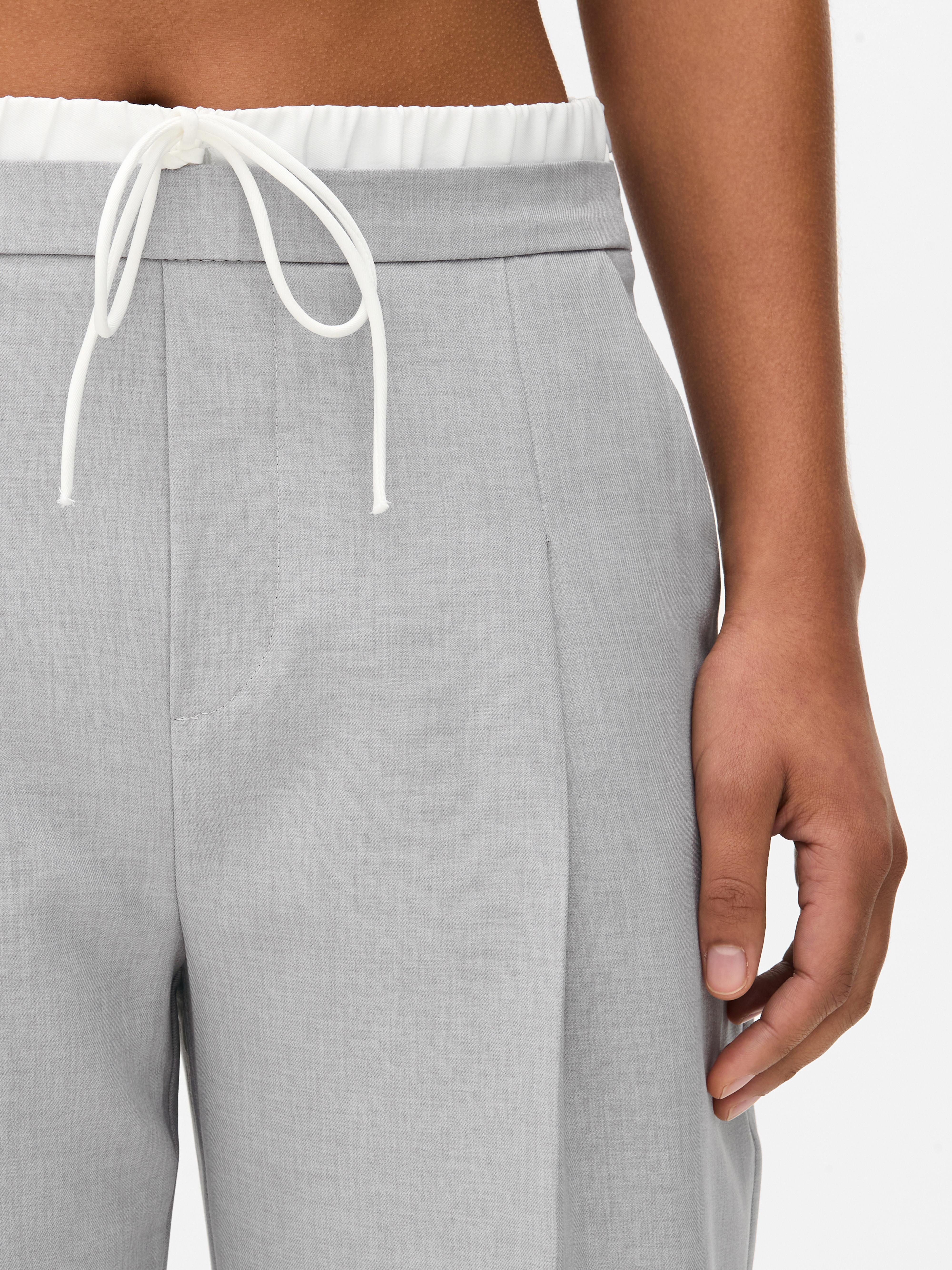 Broek met contrasterende taille