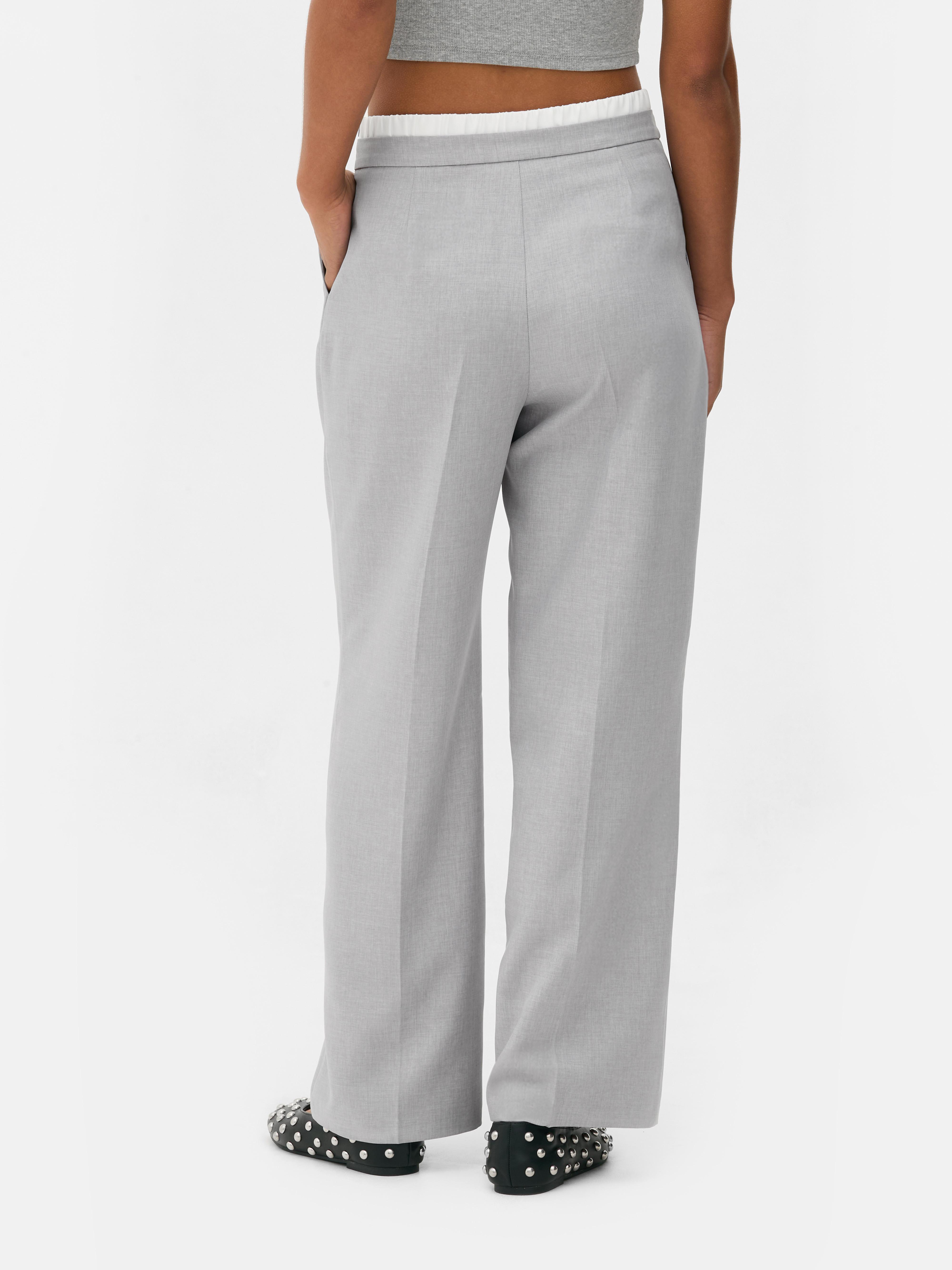 Broek met contrasterende taille