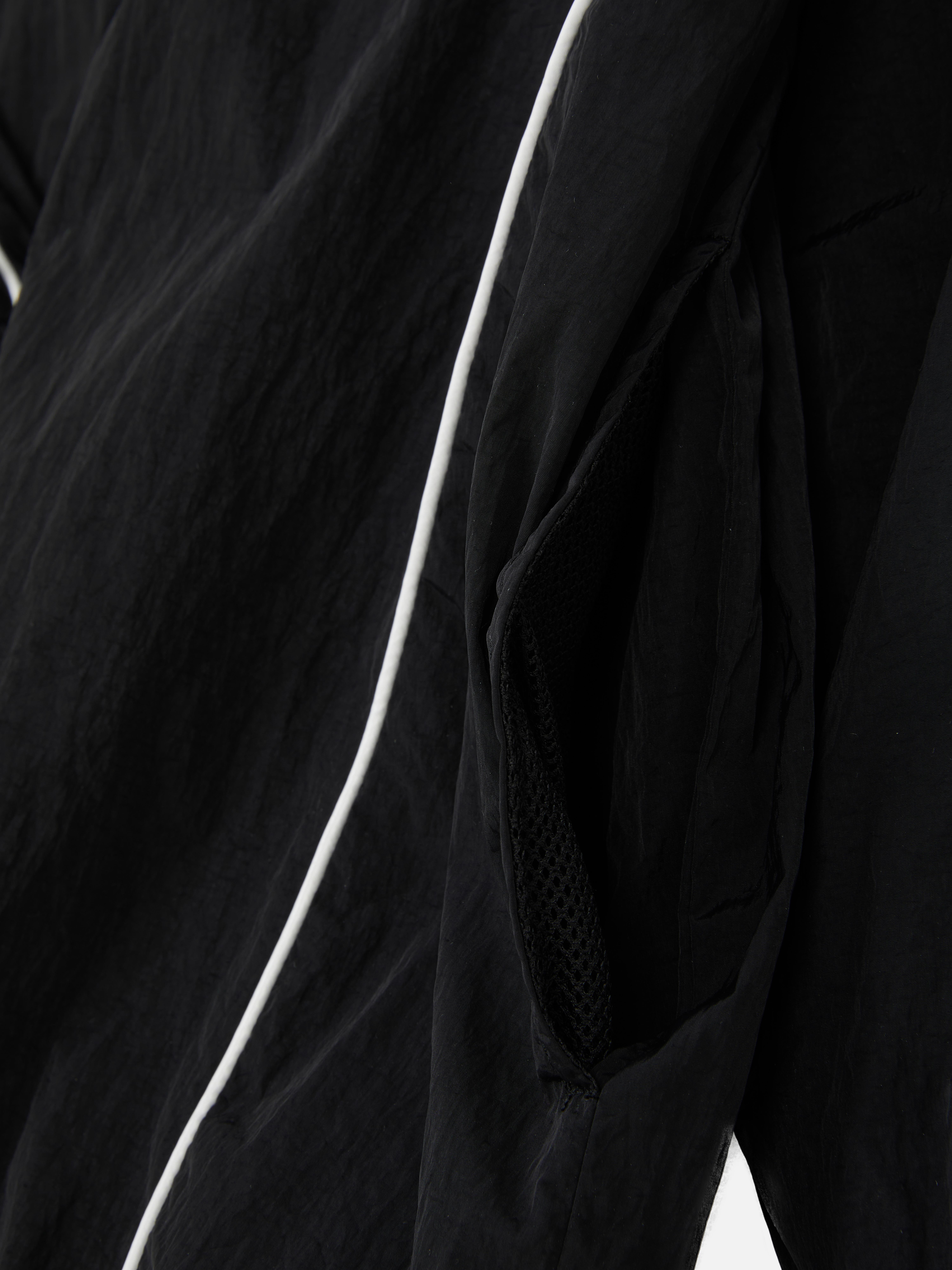 Veste de sport à passepoil contrasté