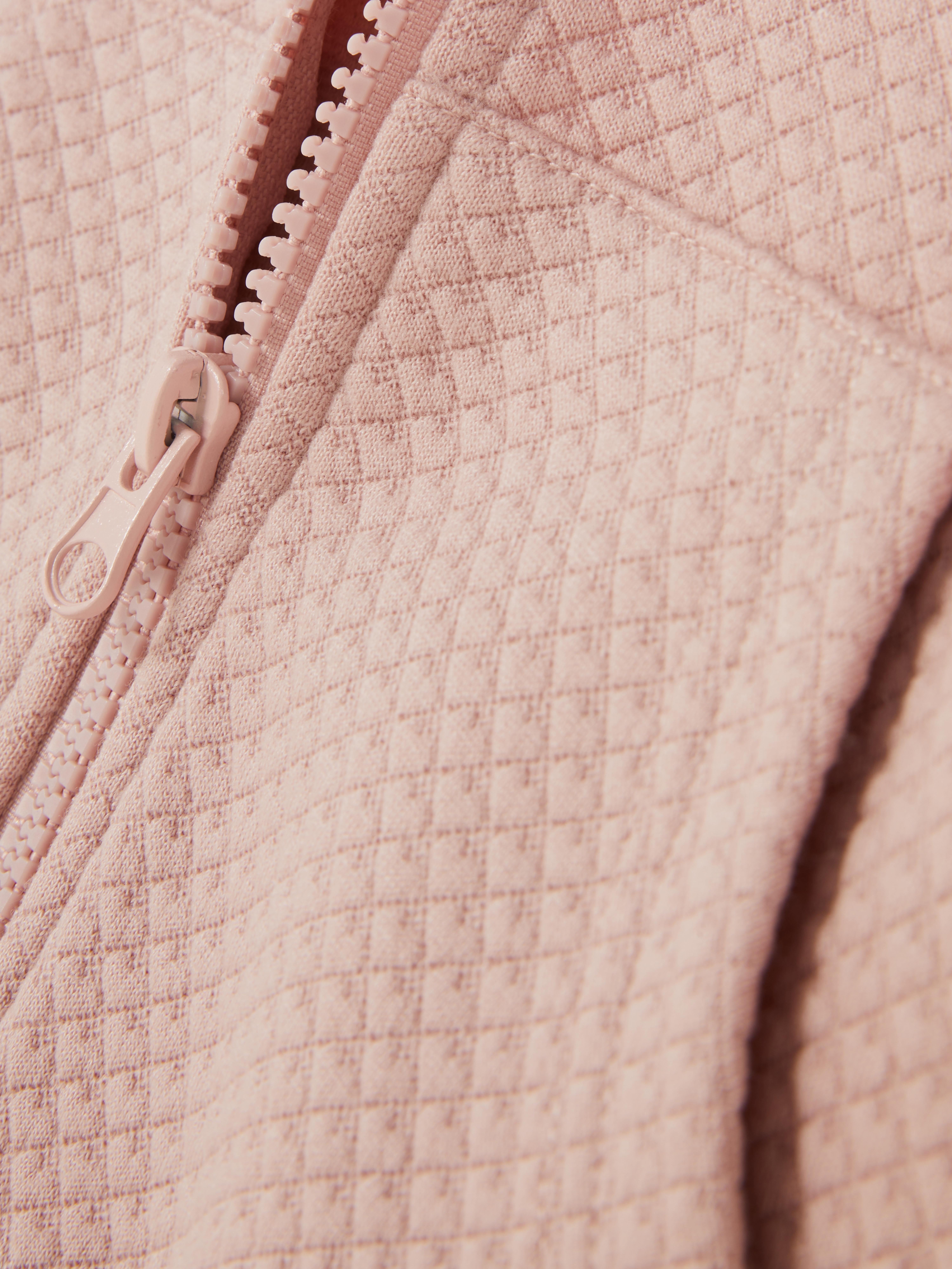 Sudadera texturizada con capucha y cremallera
