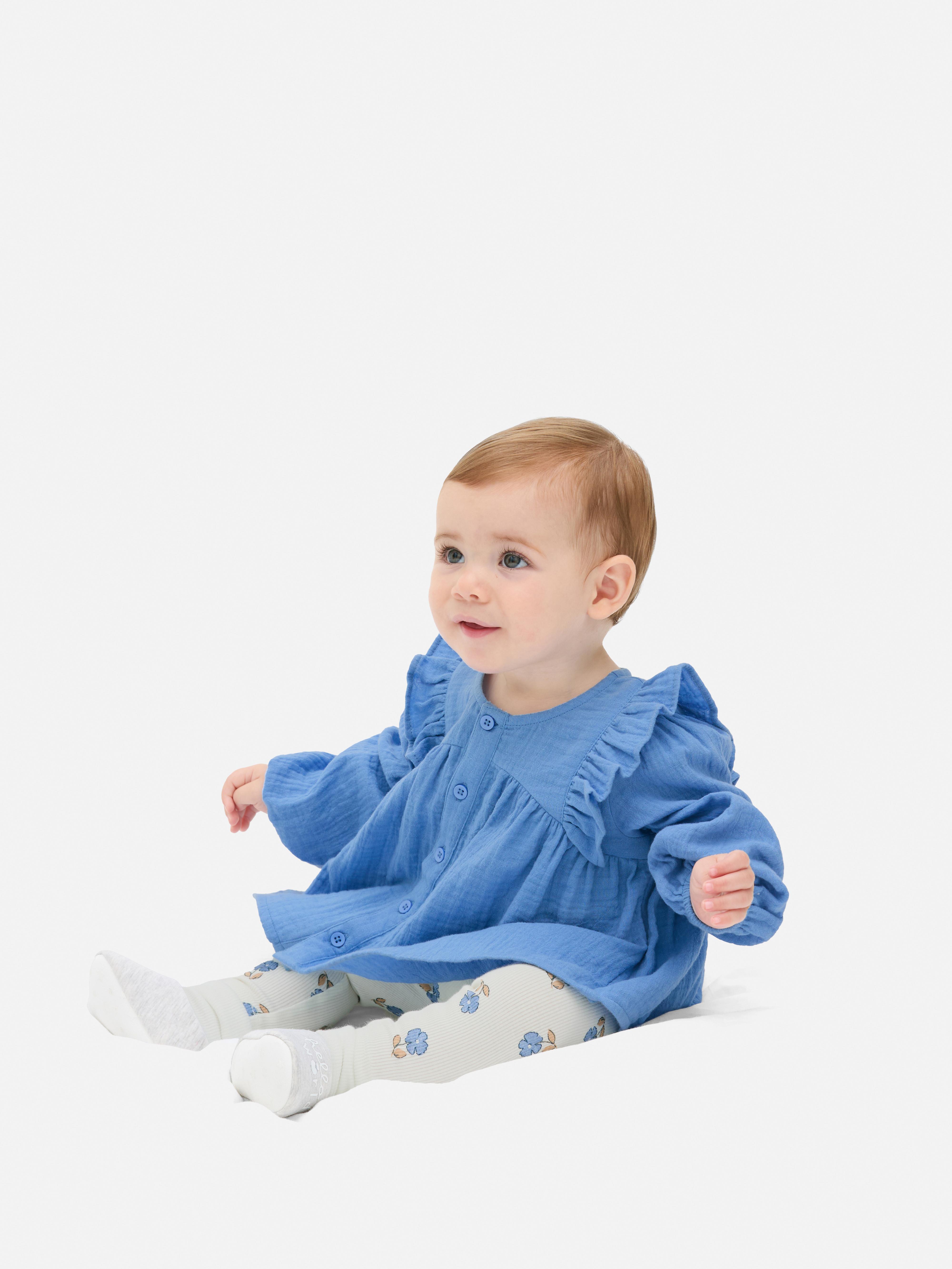 Bluzka z falbanką i legginsy w kwiaty