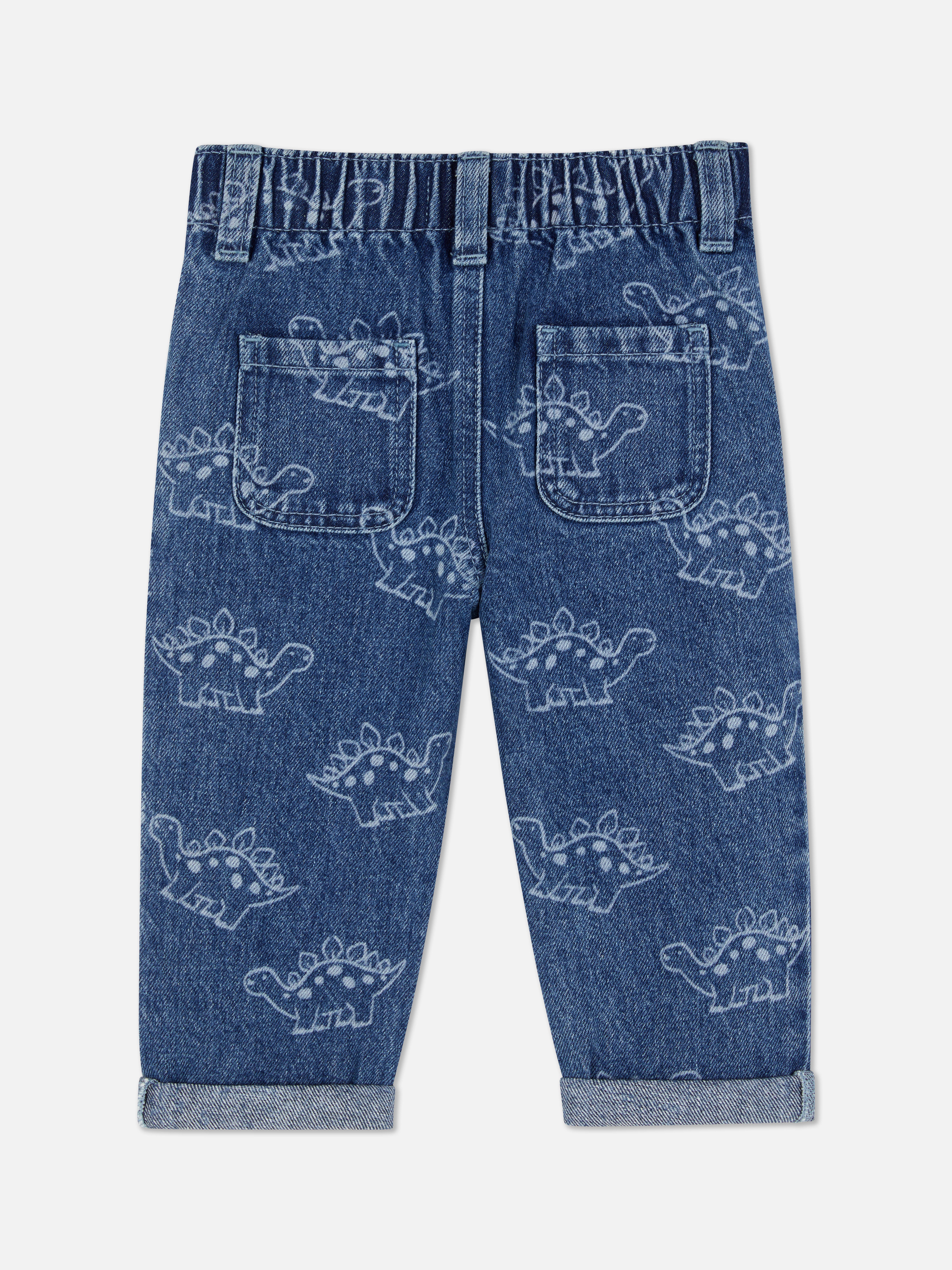 Jean en denim brodé à motif dinosaures