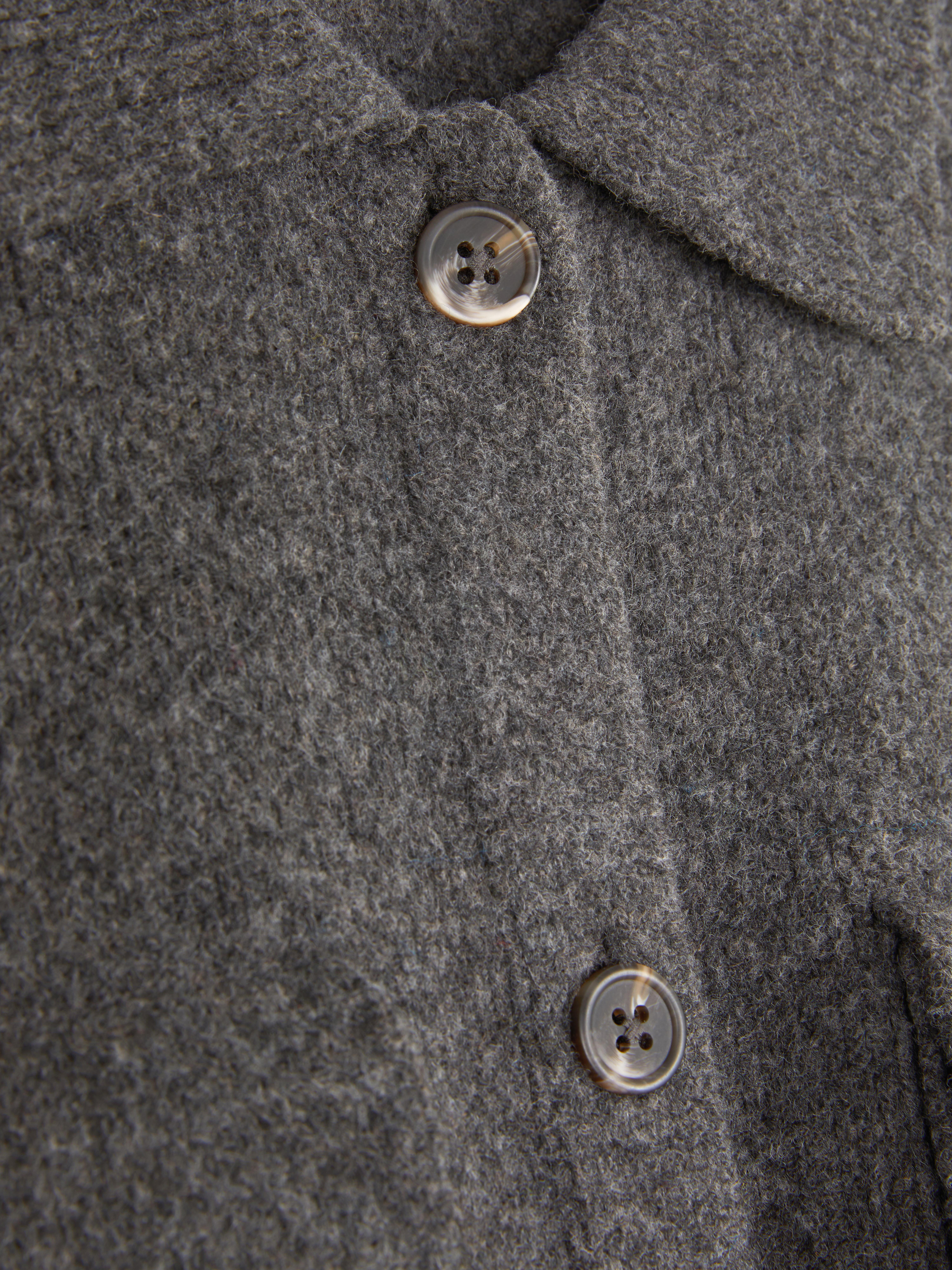 Camisa-chaqueta de punto con dos bolsillos