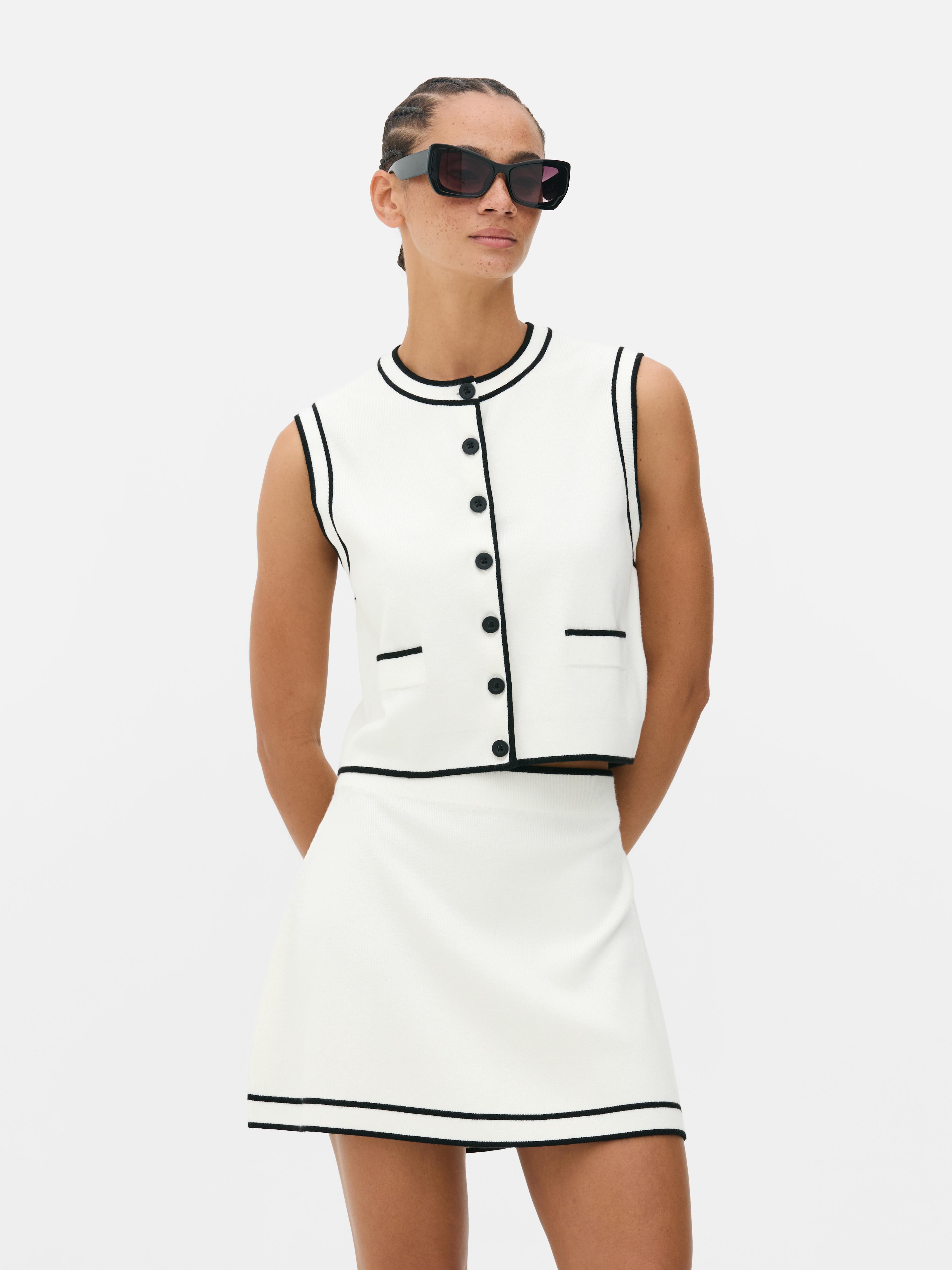 Gilet con bottoni a contrasto