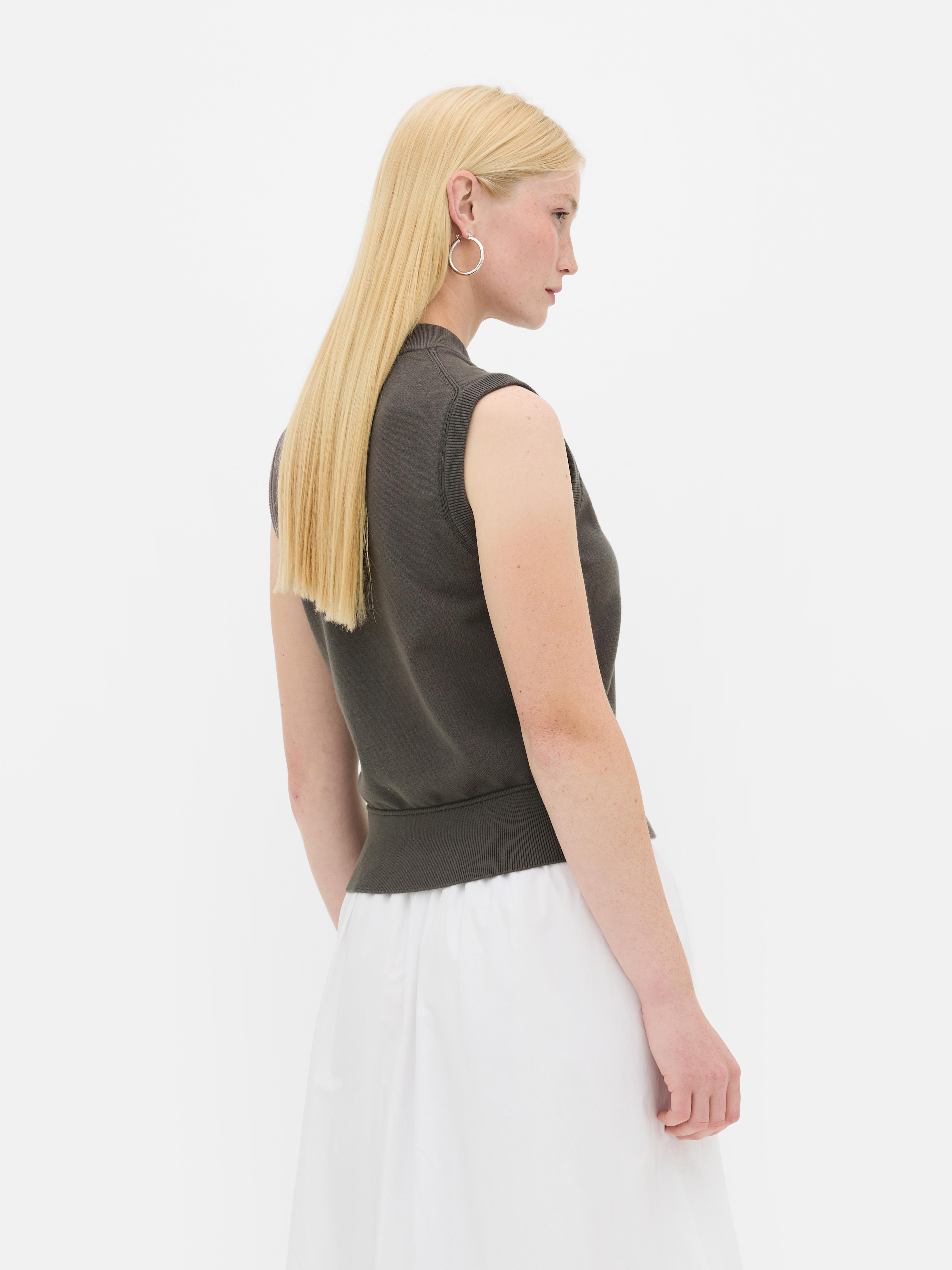 Chaleco con tapeta con pespuntes