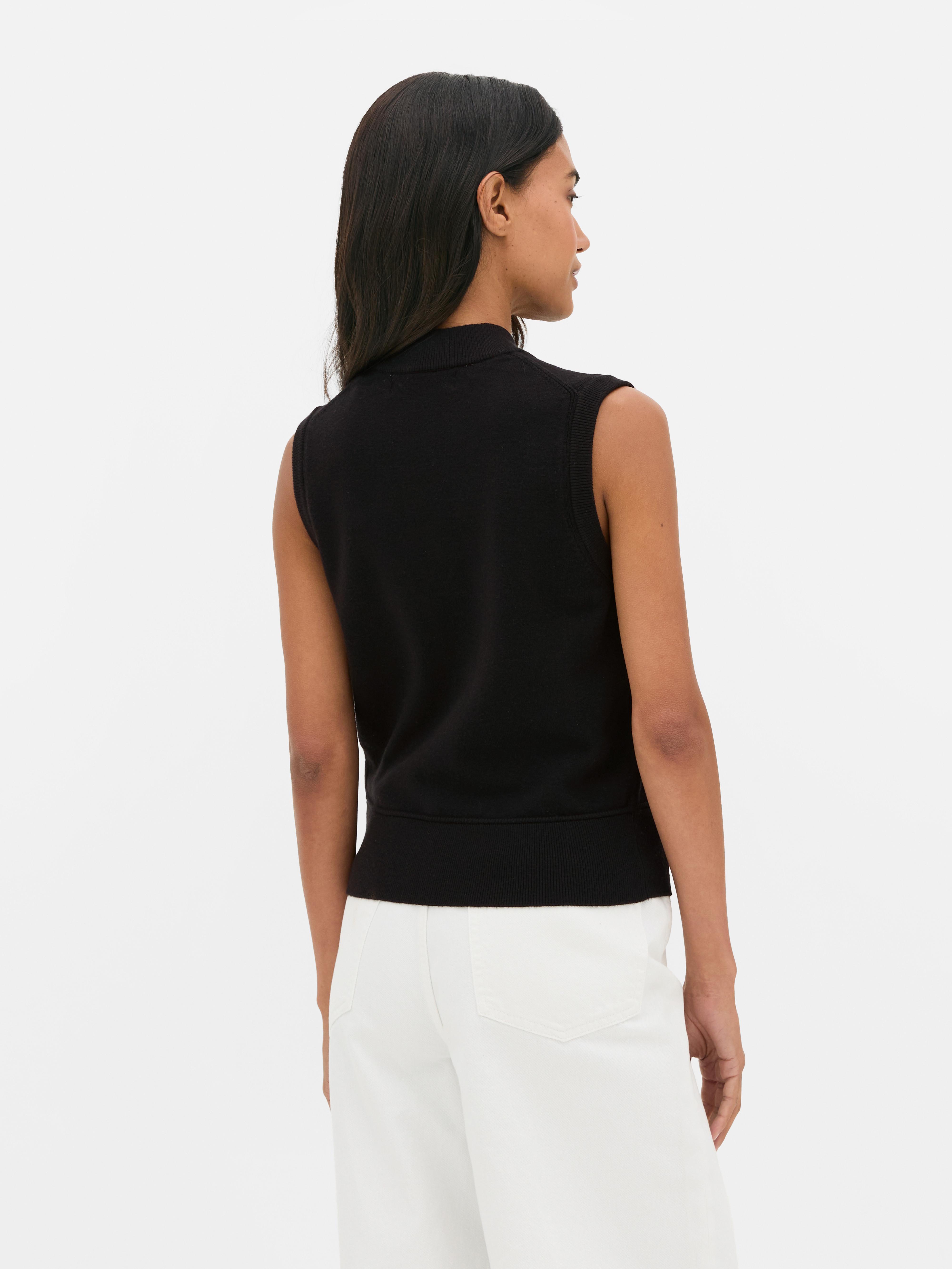 Chaleco con tapeta con pespuntes