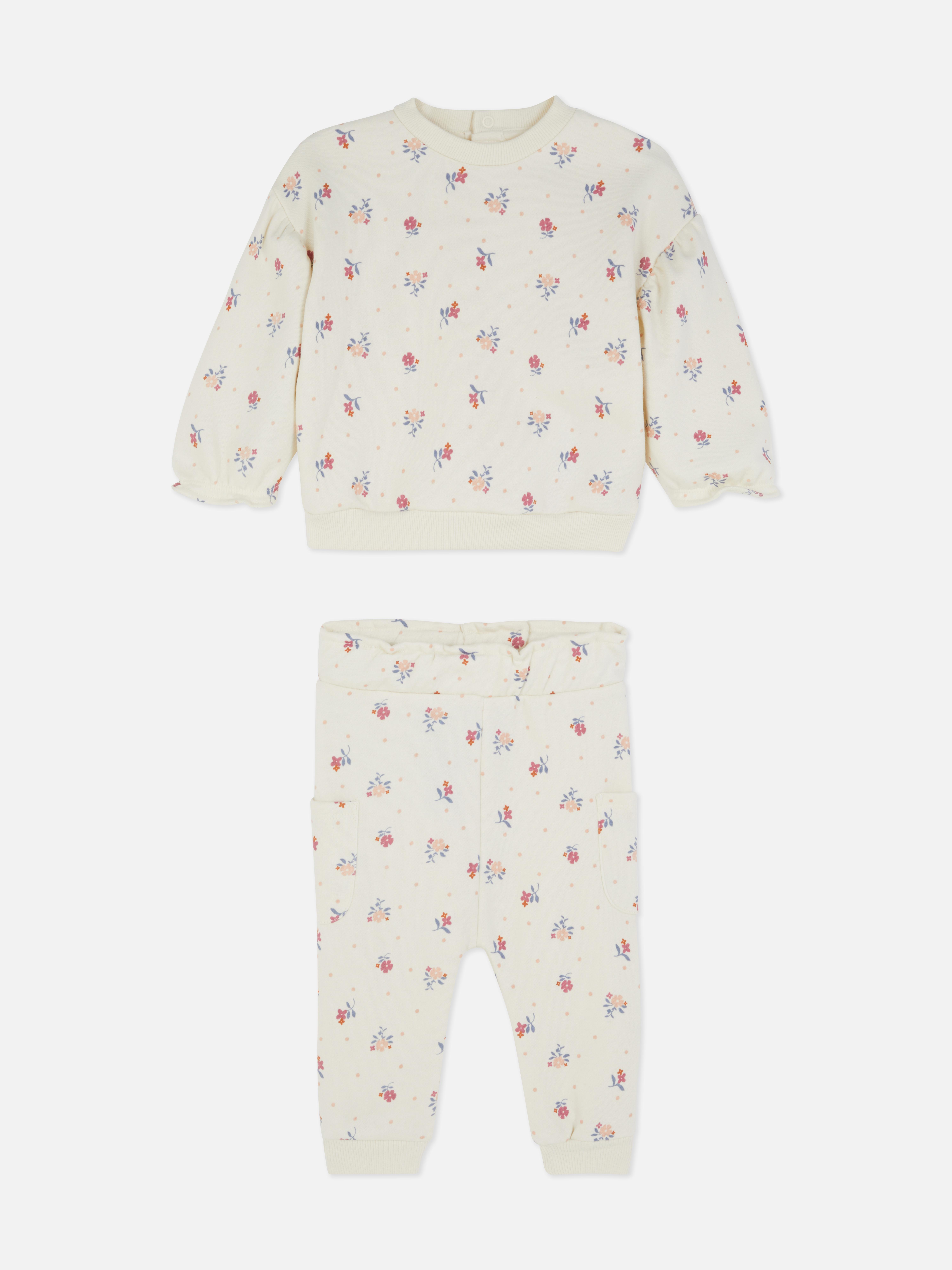 Set cu bluză sport și colanți cu model floral