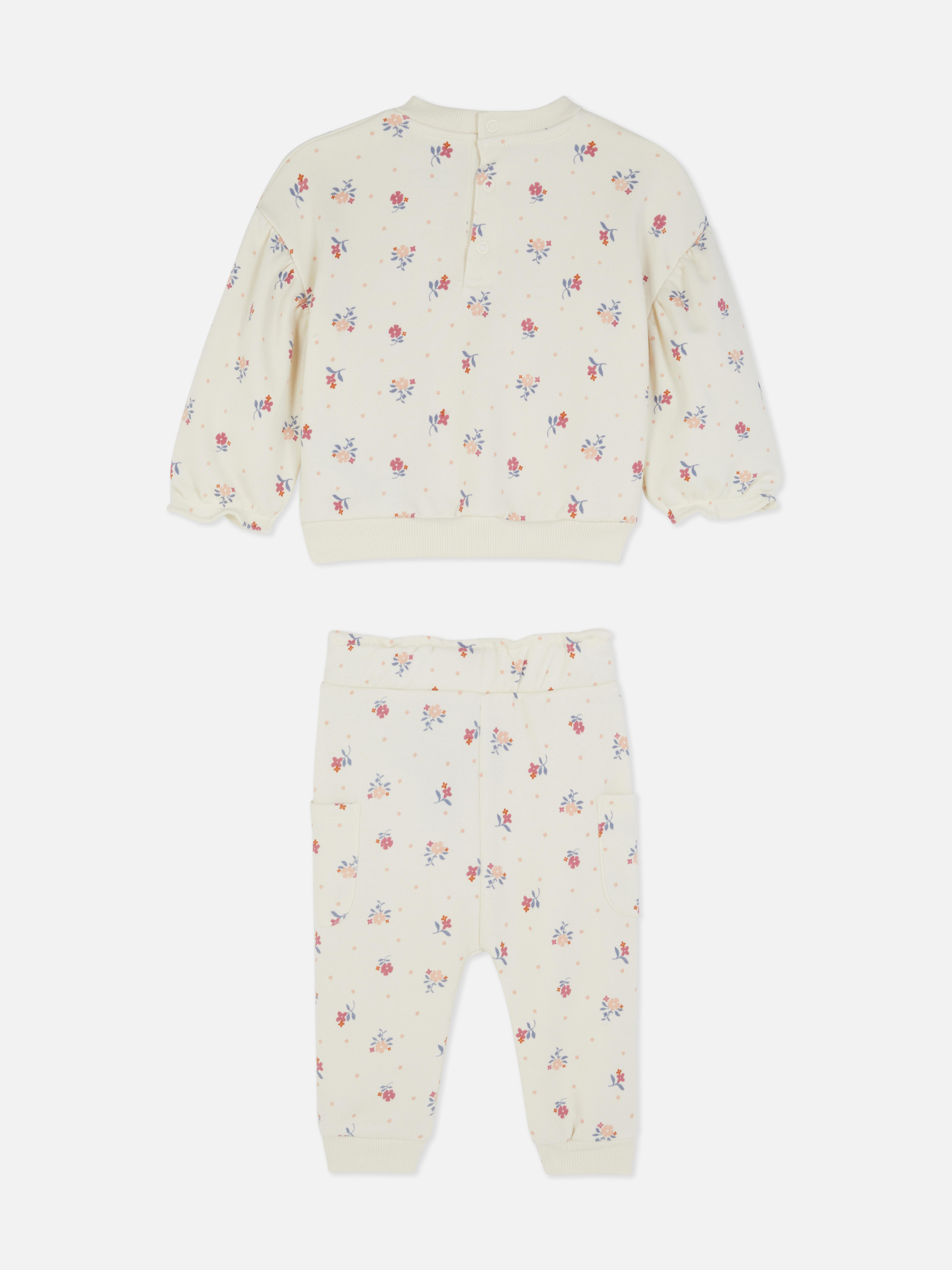 Set cu bluză sport și colanți cu model floral