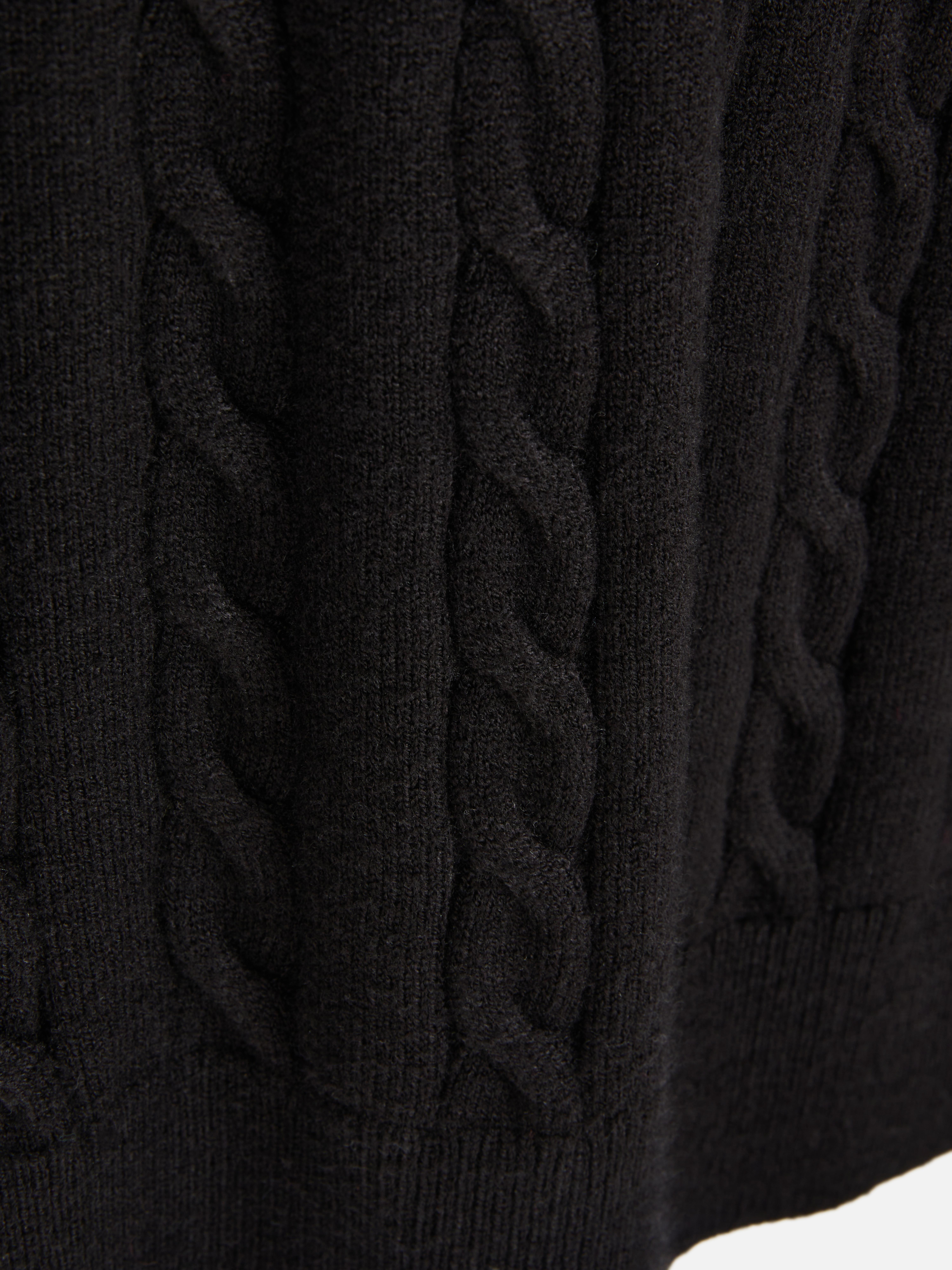 Pull torsadé à col roulé