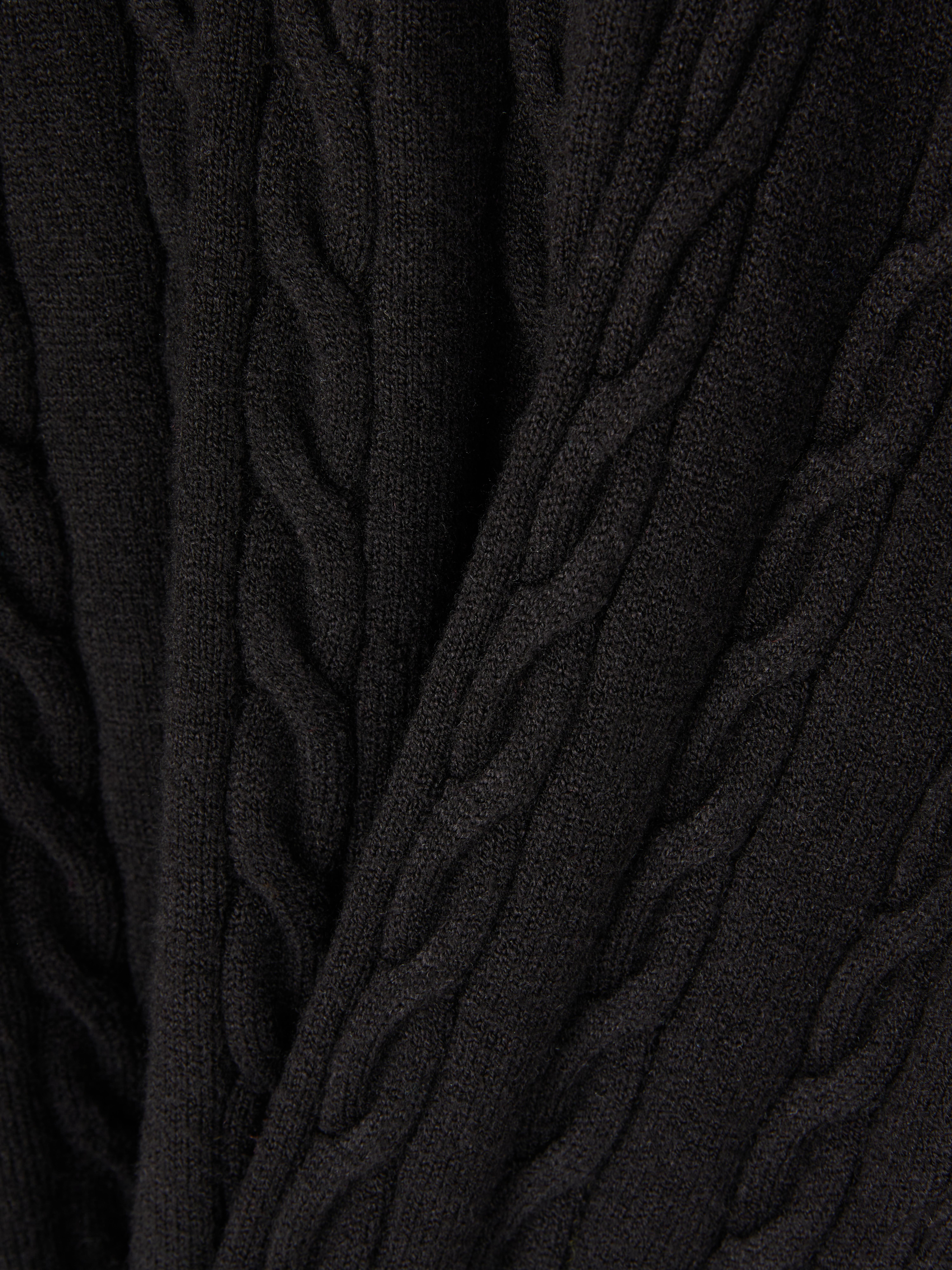 Pull torsadé à col roulé